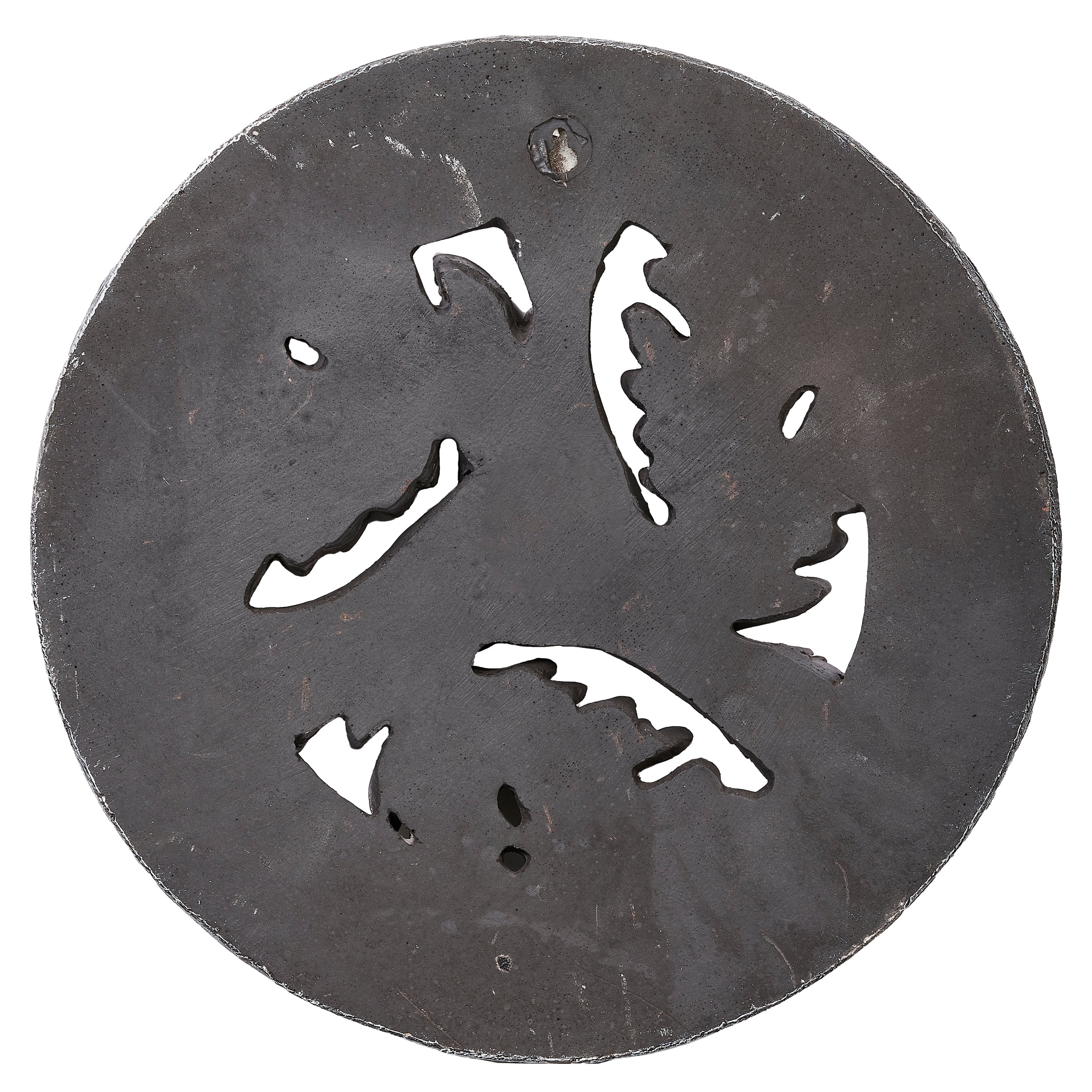 Decorative metal plate with cut-out shapes on a white background