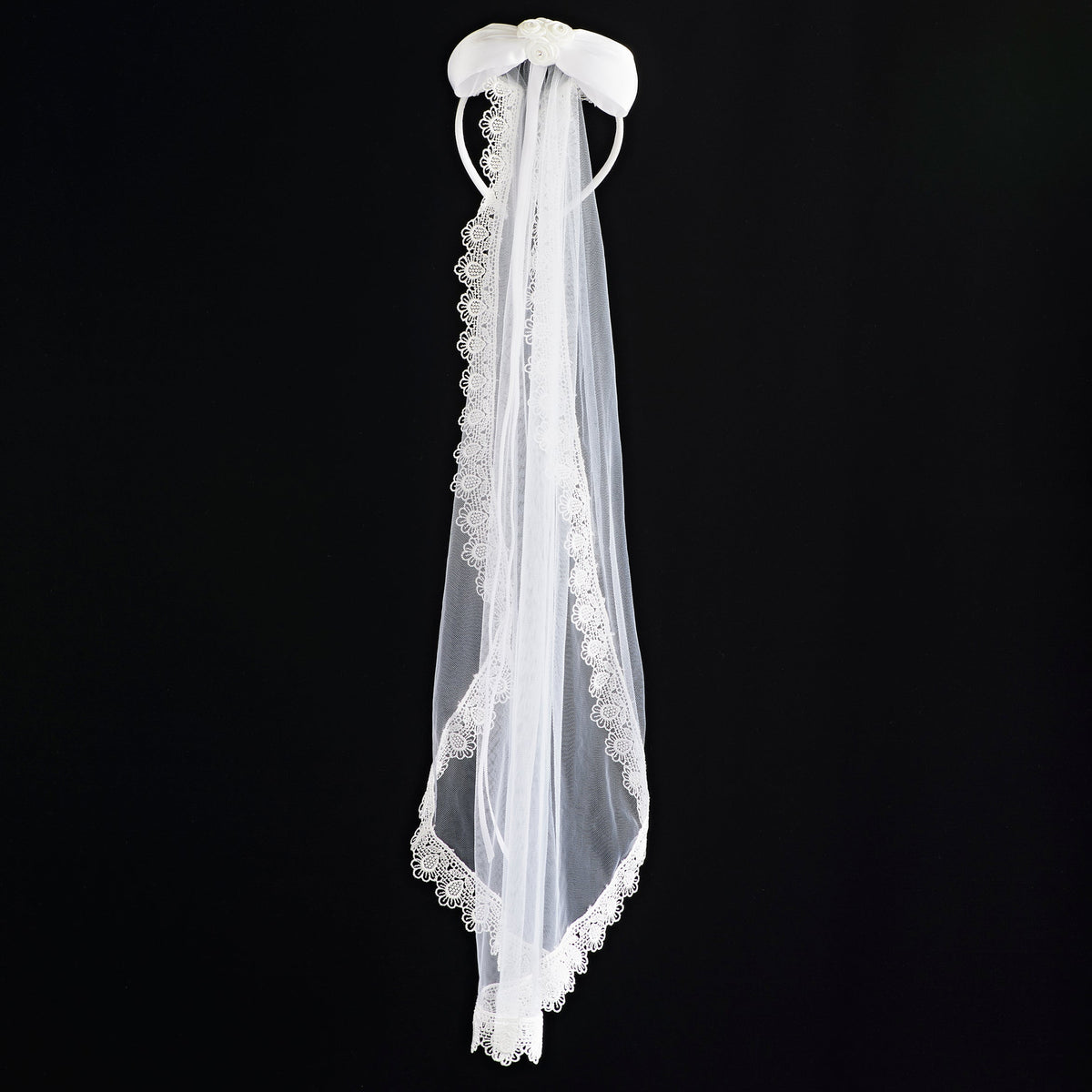 Back view of Sophia First Communion veil showing the white satin bow and long lace-trimmed veil draping down the back