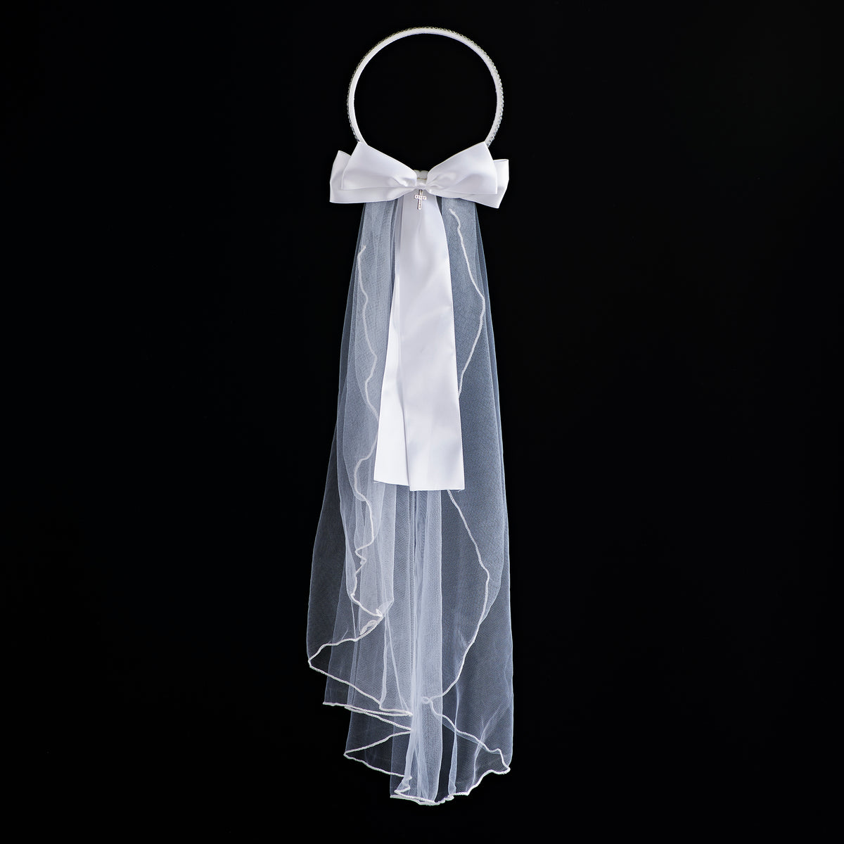 Back view of Olivia First Communion veil showing the large satin bow and layered white tulle veil draping down the back