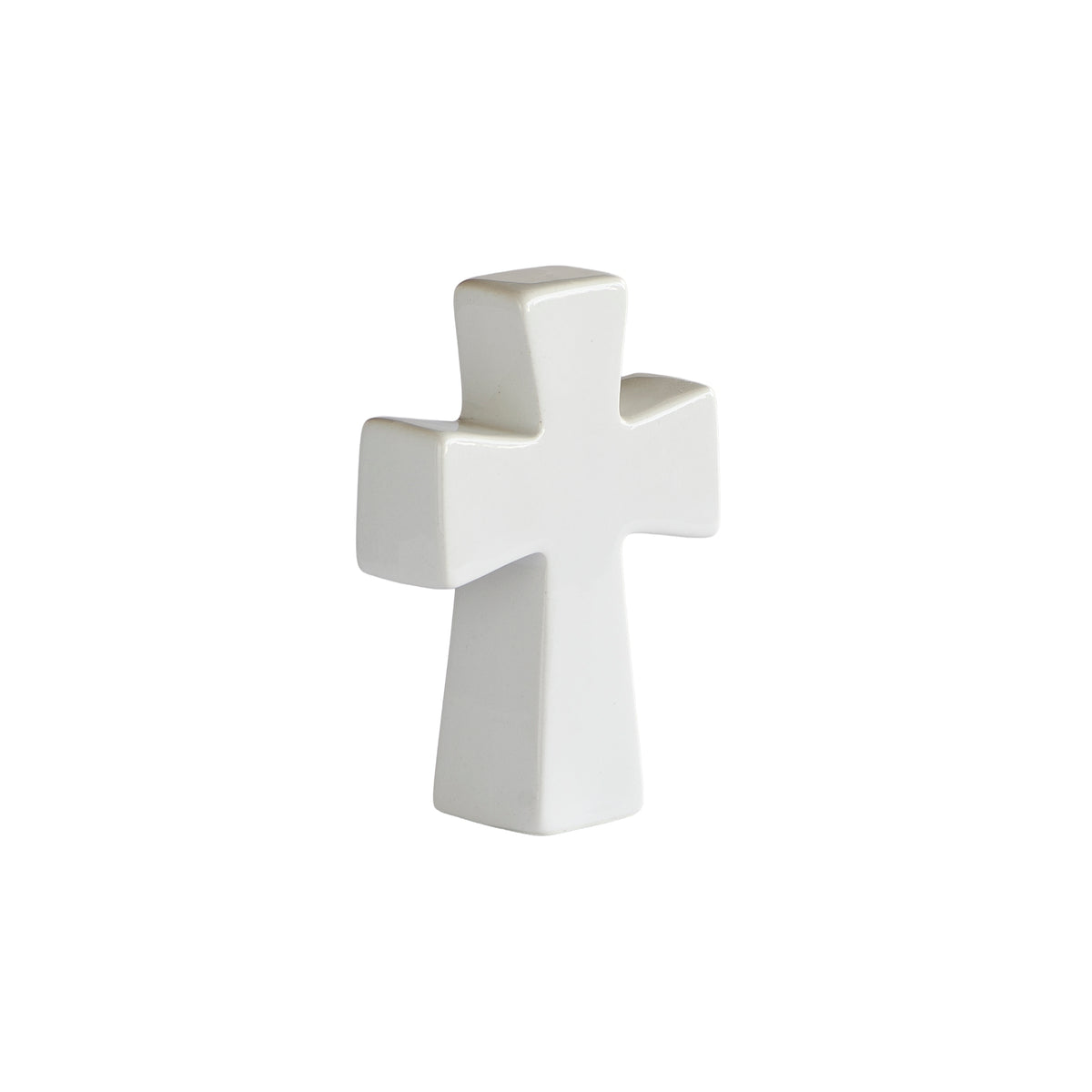 Angled rear view of anniversary cross showing its plain white back and thick profile.
