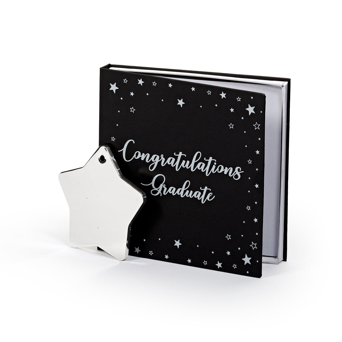 Rear view of graduation star ornament showing its plain silver-toned back beside black gift packaging.
