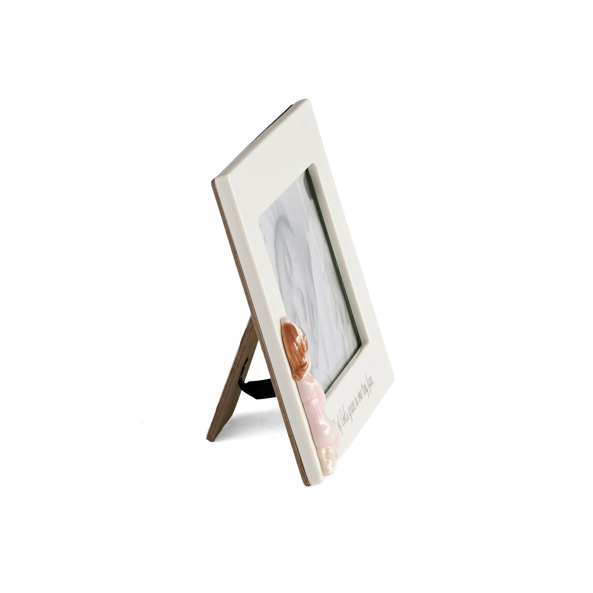 Side view of pink All of God's Grace Baby Picture Frame showing the porcelain frame and tabletop easel stand