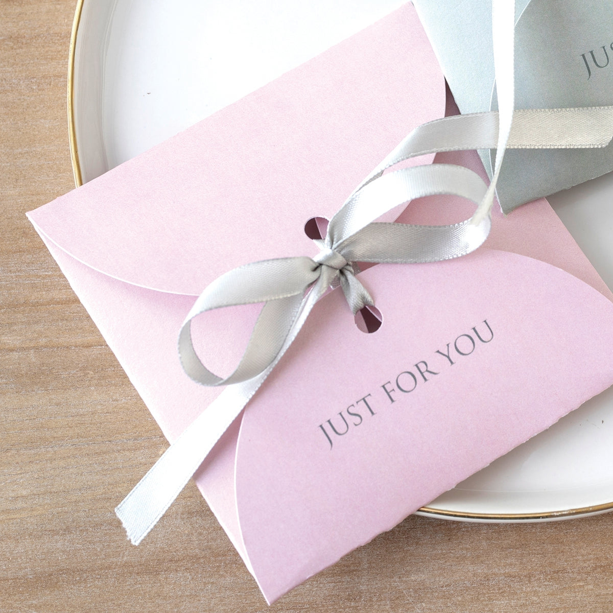 Live by Faith Scapular Necklace gift packaging with pink box and ribbon