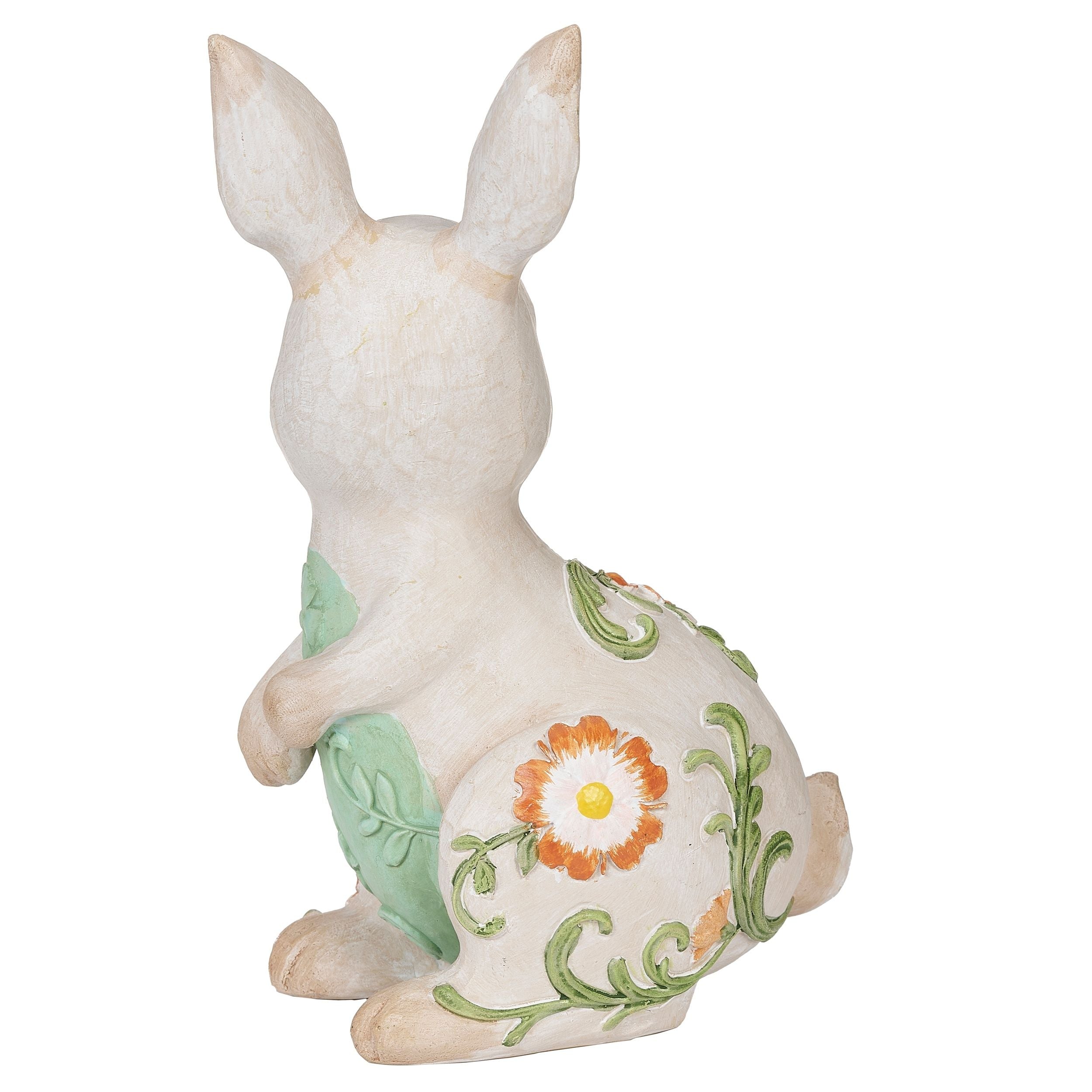 Decorative rabbit figure with floral design on a white background