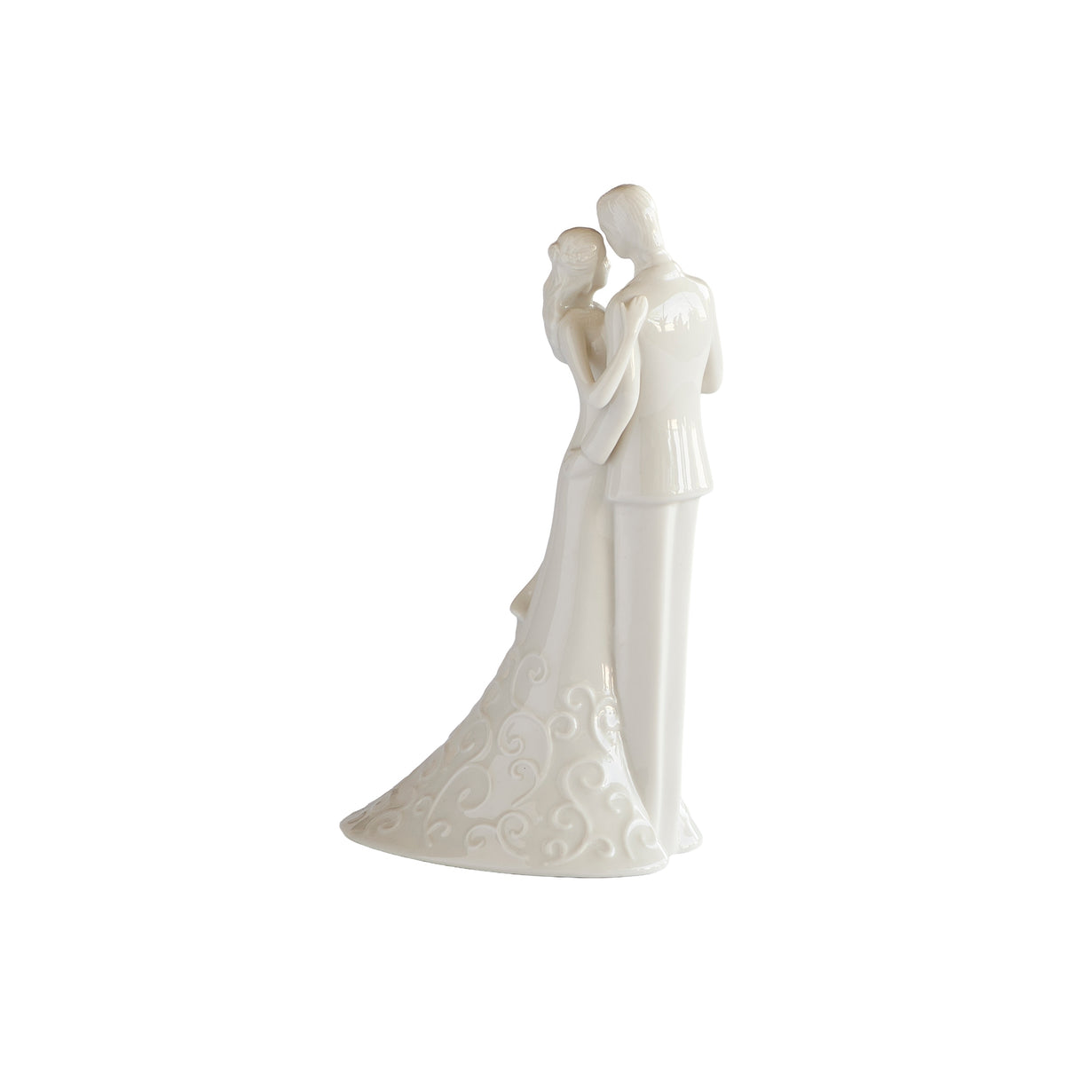 Opposite angled view of wedding cake topper showing the groom beside the bride and her flowing skirt.