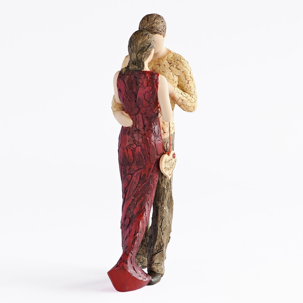Side view of Happy Anniversary figure showing the couple standing closely together in red and neutral-toned clothing