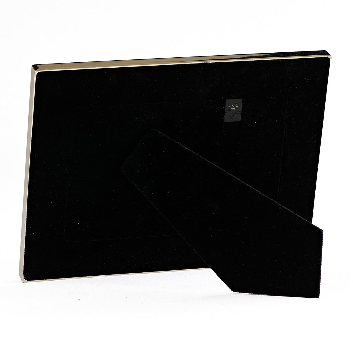 Back view of Caroline Collection Silver Cross Picture Frame showing the black backing and easel stand