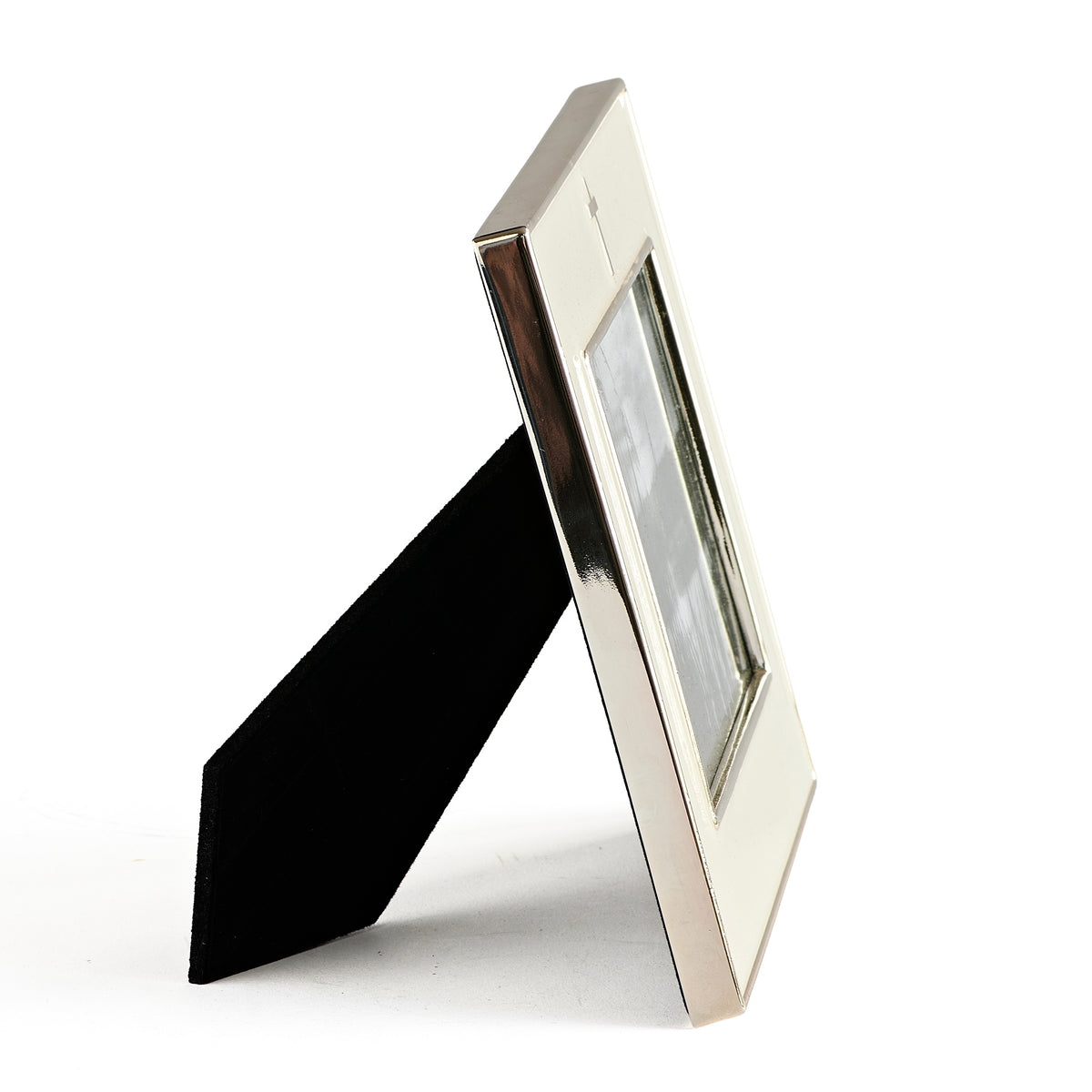 Side view of Caroline Collection Silver Cross Picture Frame showing the slim metal frame and black tabletop stand