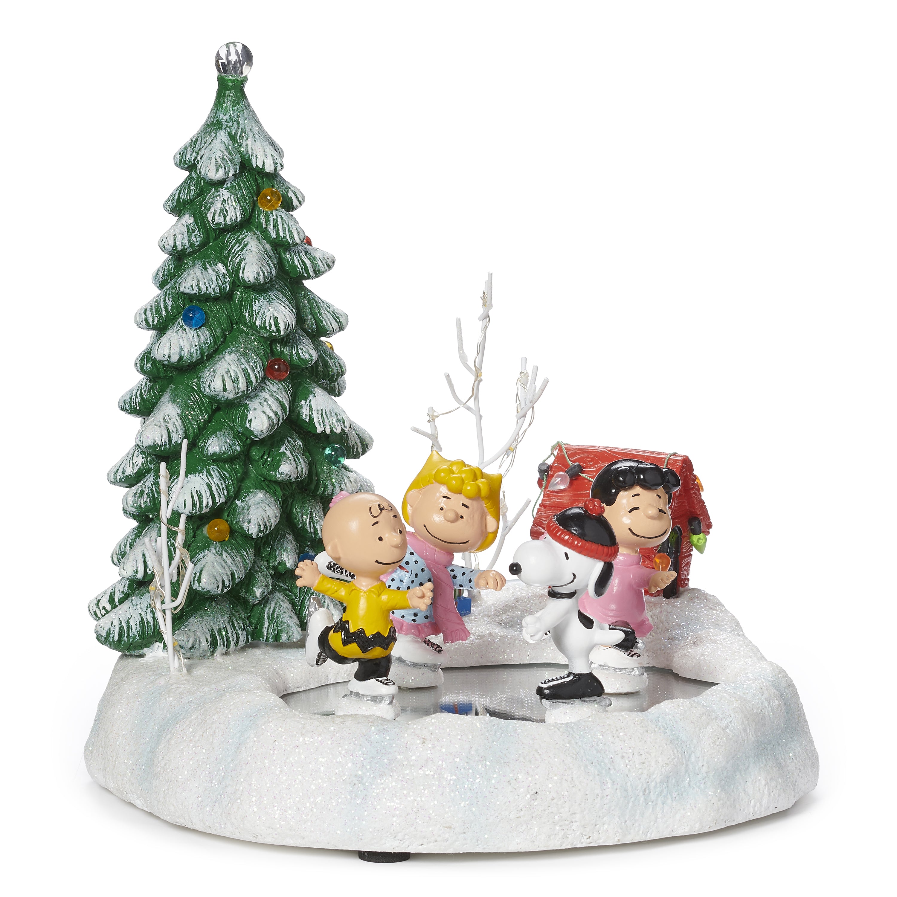 peanut characters ice skating in front of a christmas tree