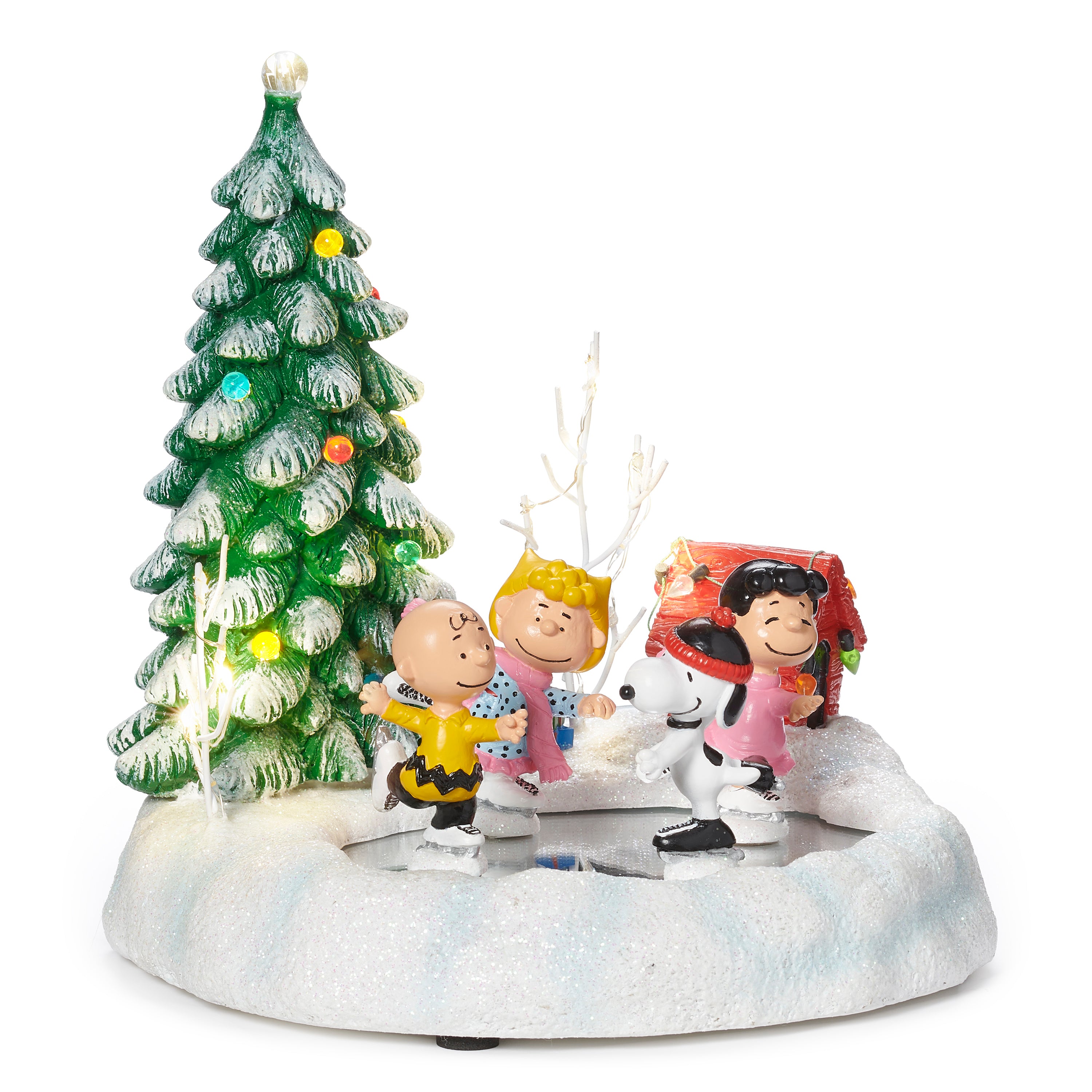 peanut characters ice skating in front of a christmas tree