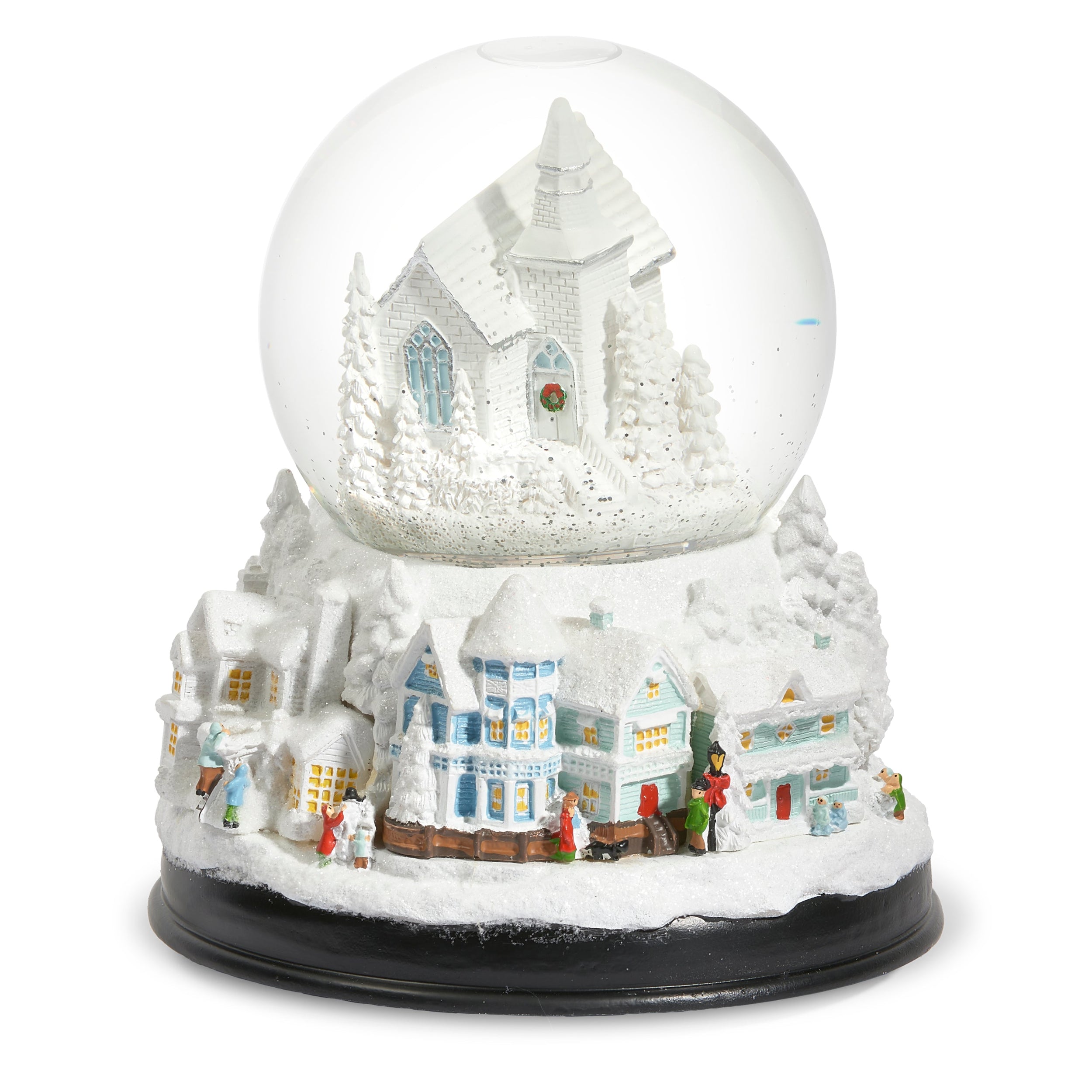 Snow globe with a church and snowy landscape inside