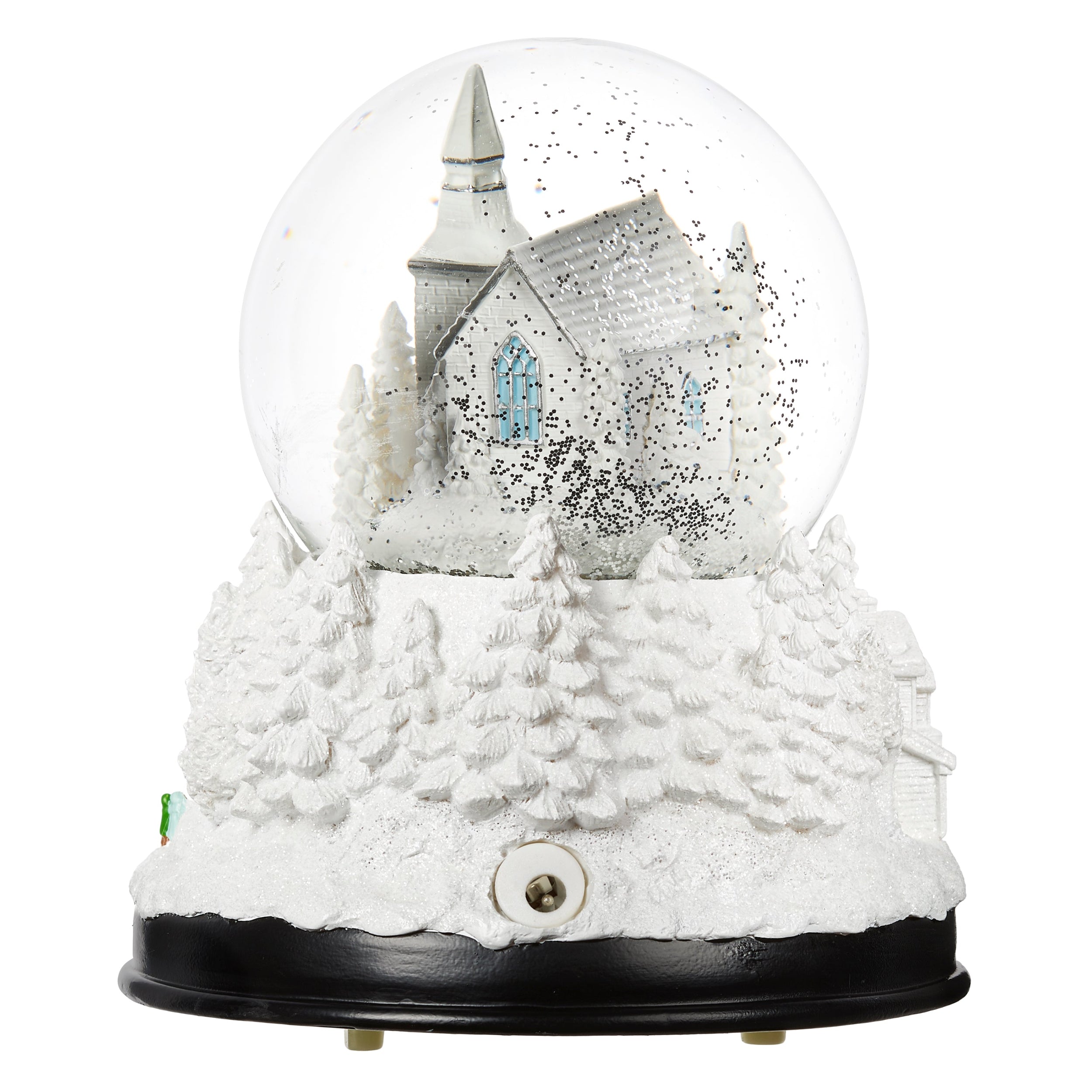 Snow globe with a church and snowy landscape inside
