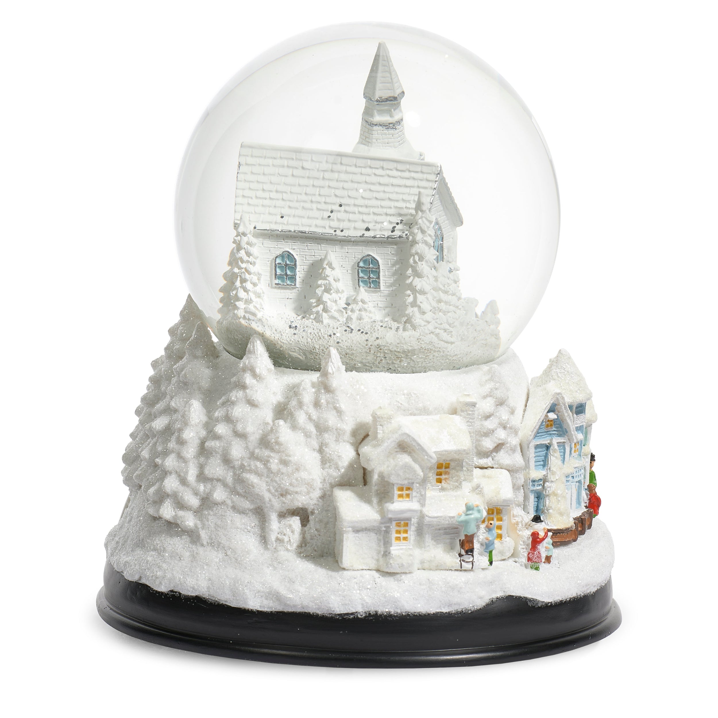 Snow globe with a winter village scene featuring a church and houses.