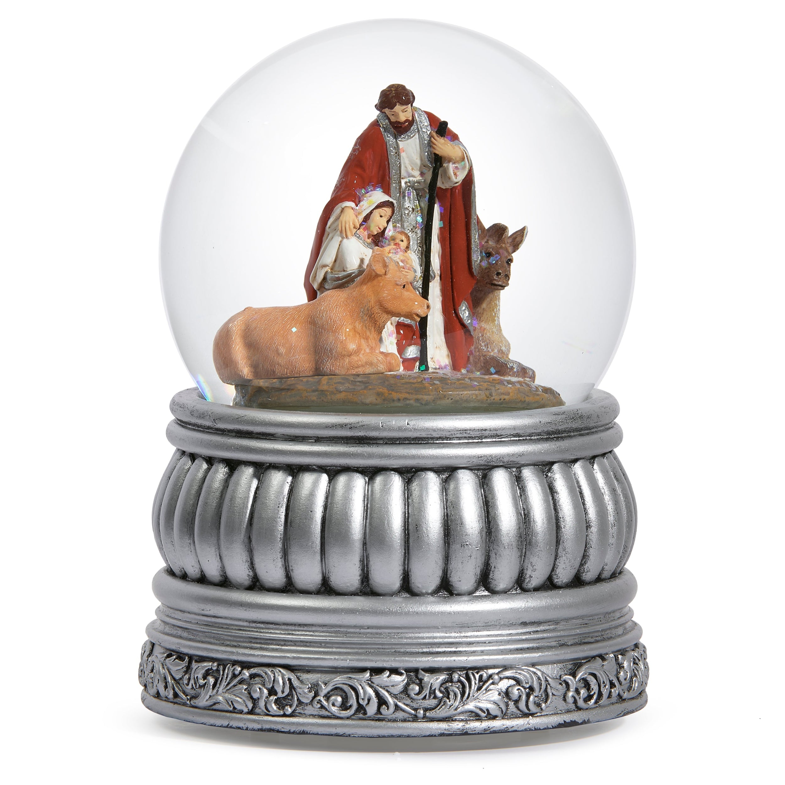 Decorative snow globe with nativity scene figures inside on a white background