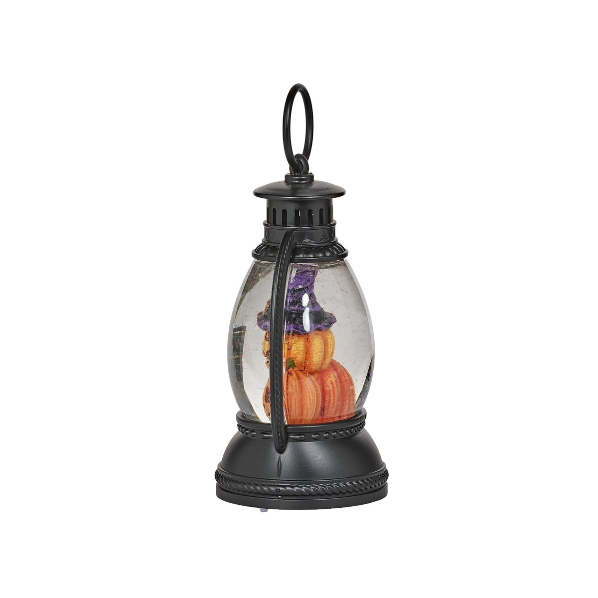 Side view of black pumpkin lantern showing its narrow clear panel and stacked pumpkins inside.
