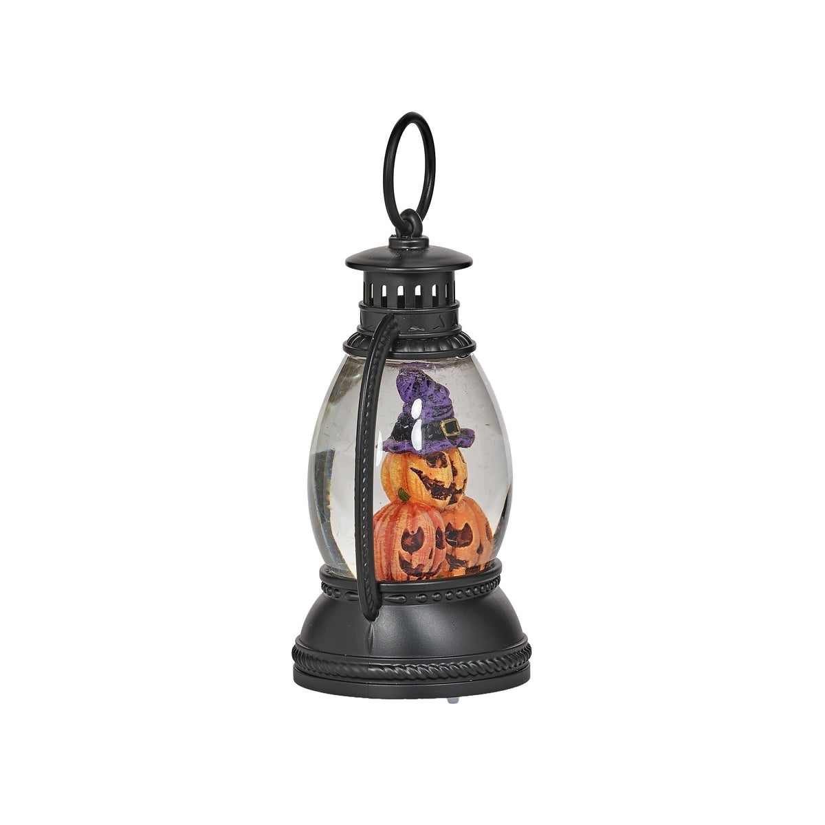 Opposite side view of black pumpkin lantern showing jack-o’-lantern faces through the curved window.