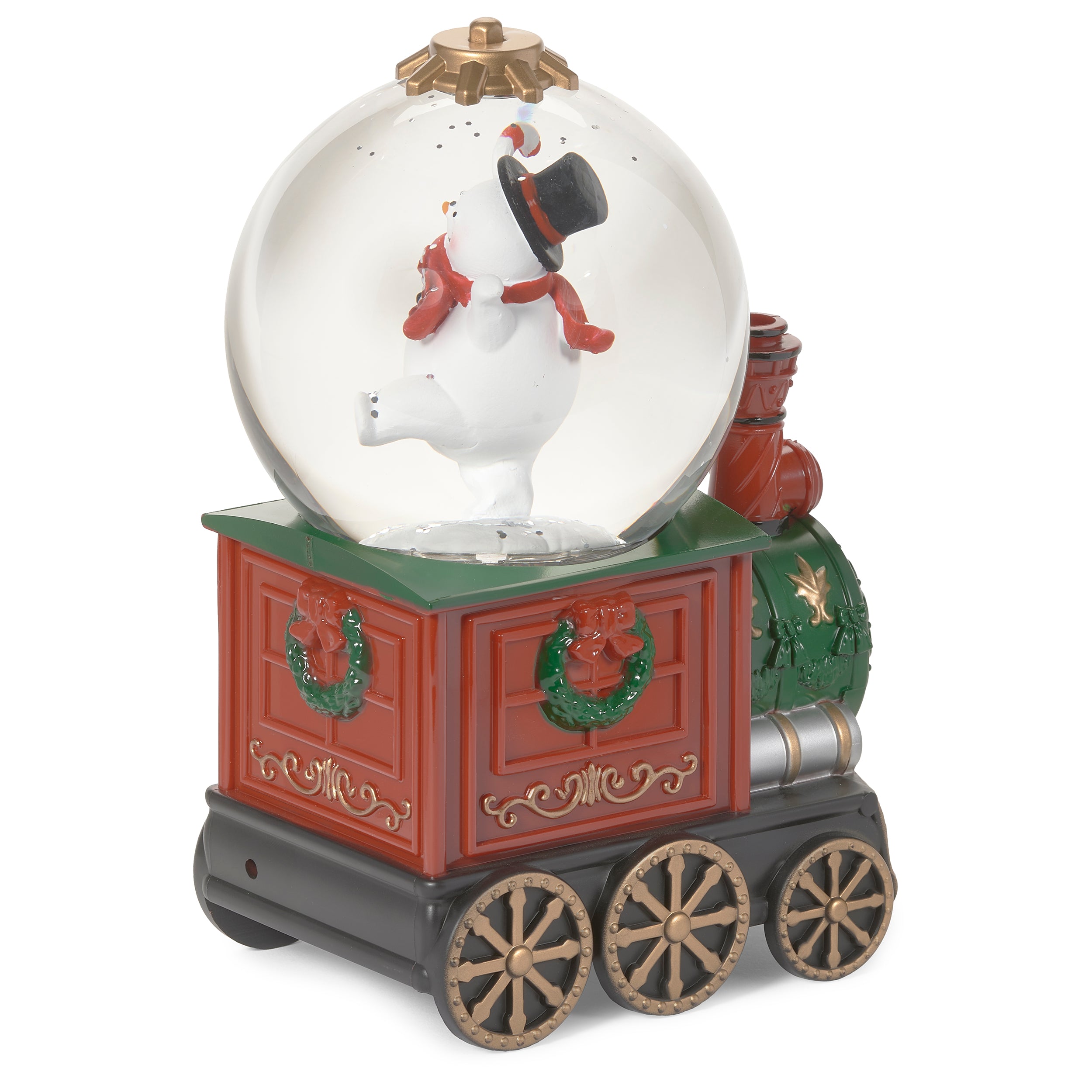 Decorative snow globe with a train design on a white background