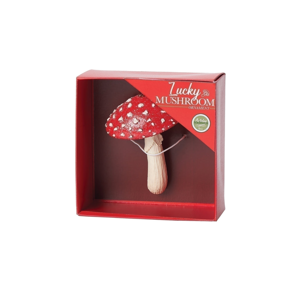 Red and white mushroom keepsake ornament displayed in a red window gift box.