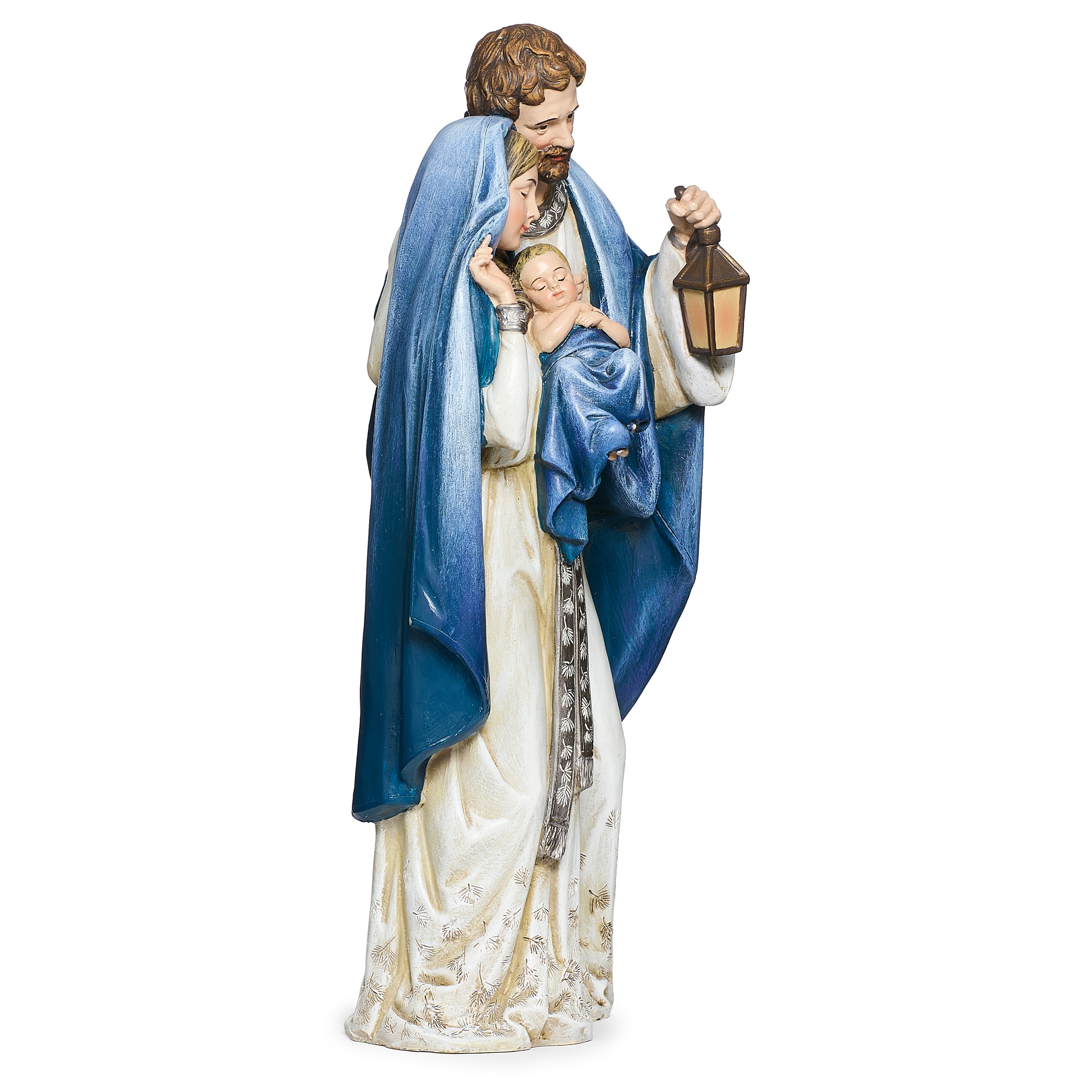 Statue of the holy family with Joseph holding a lantern on a white background