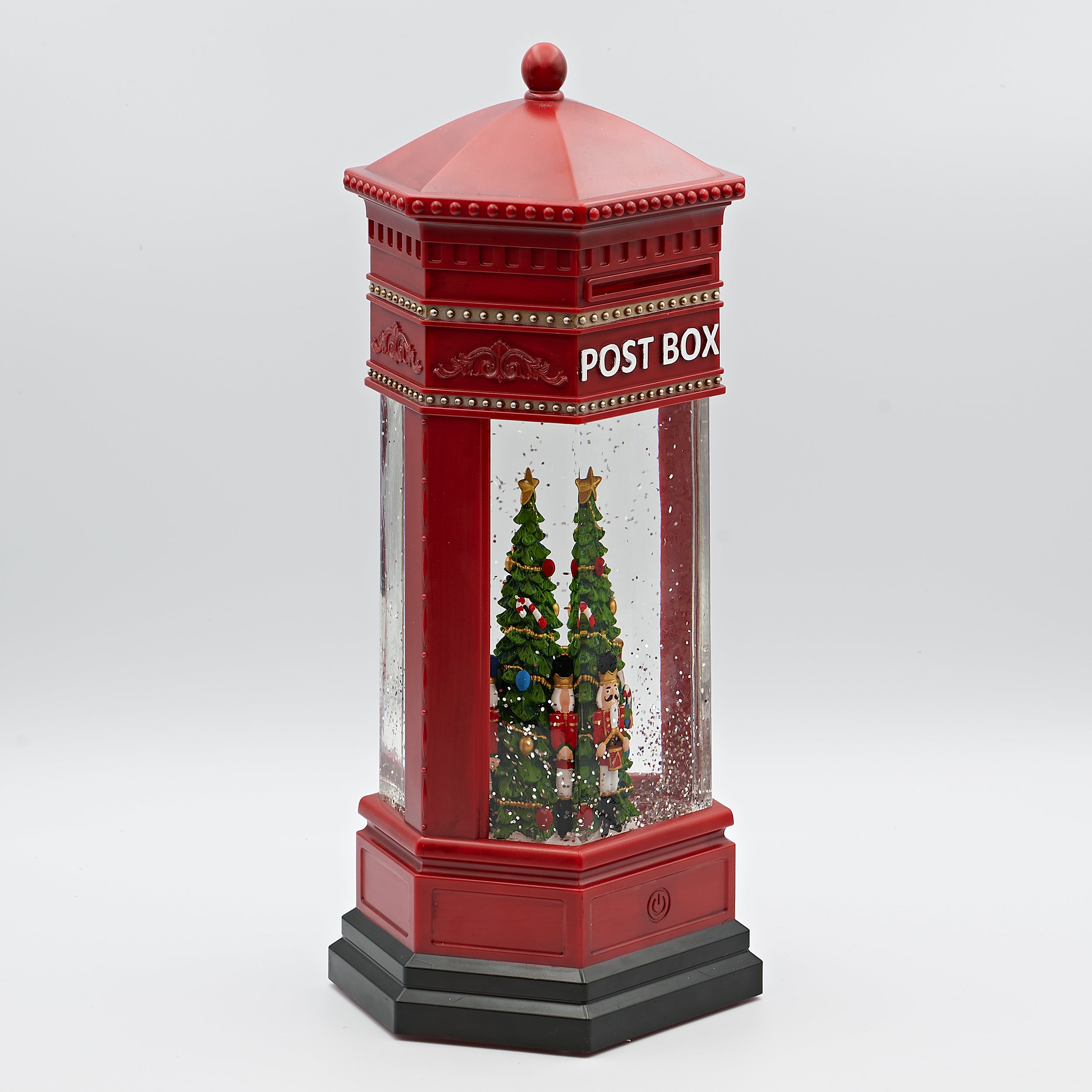 Confetti Lites Lighted Swirl Post Box with Nutcrackers around Tree