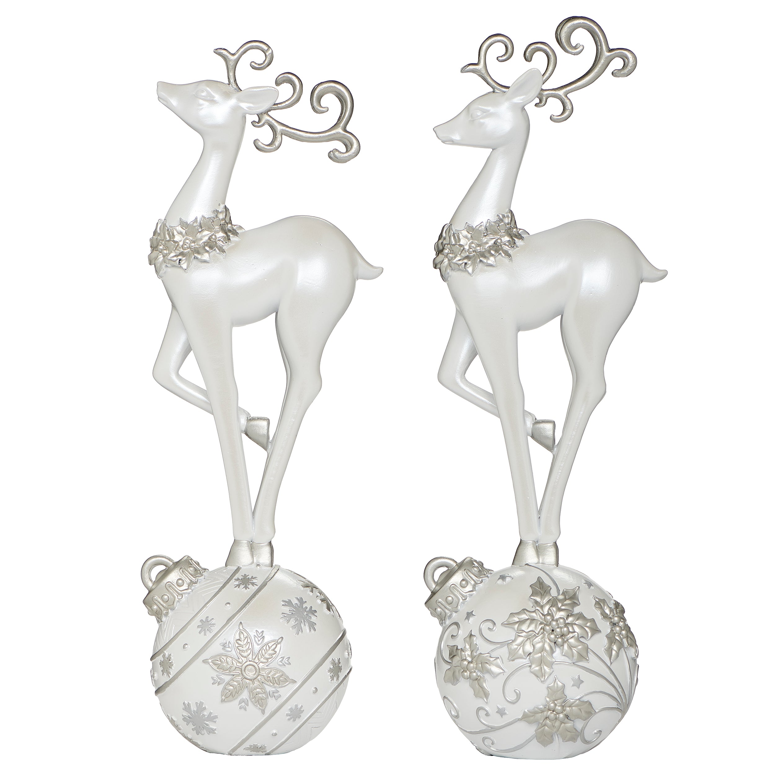 Pair of white deer figurines with decorative silver elements
