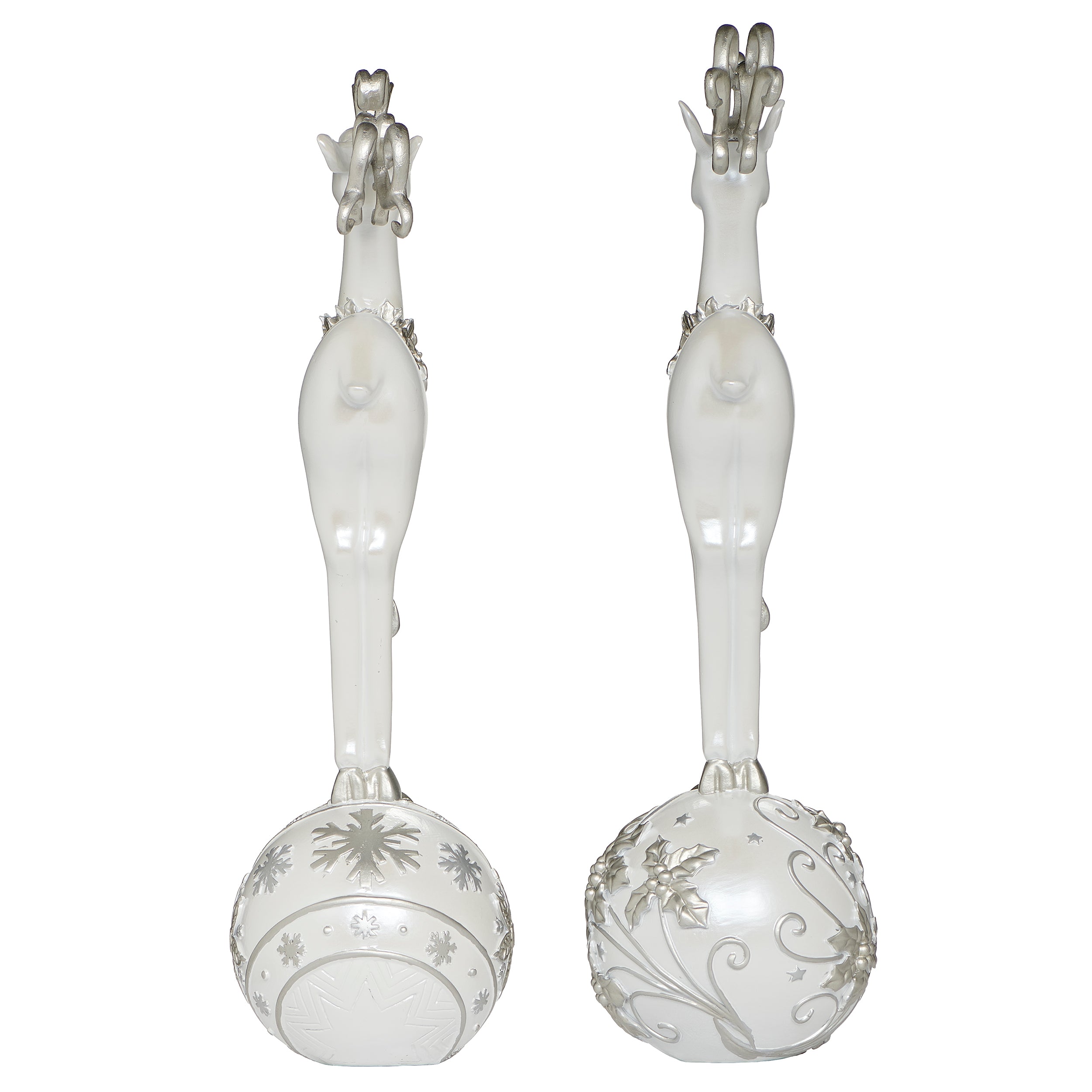 Pair of white deer figurines with decorative silver elements