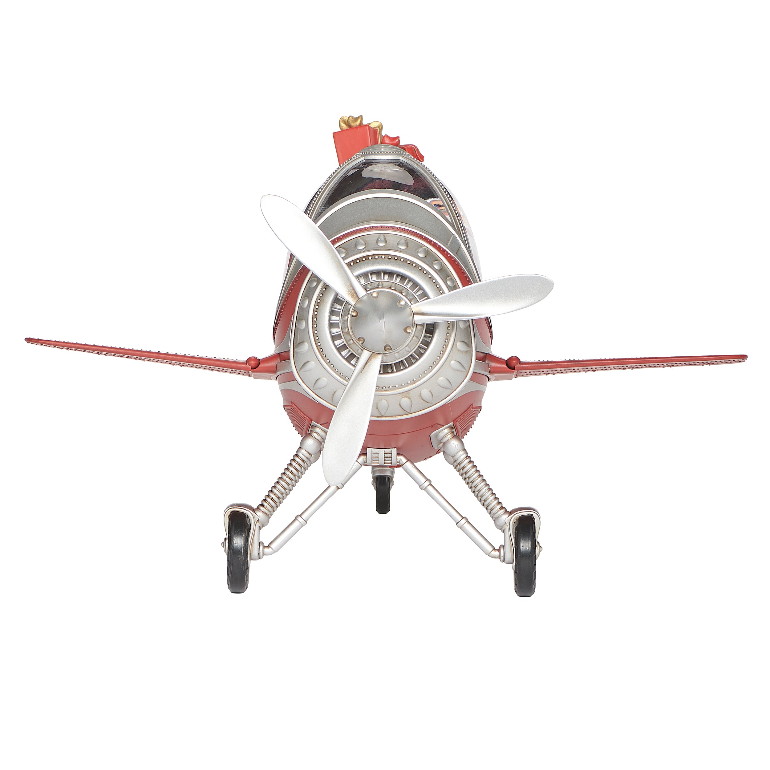Model airplane with a red body and white propeller on a white background