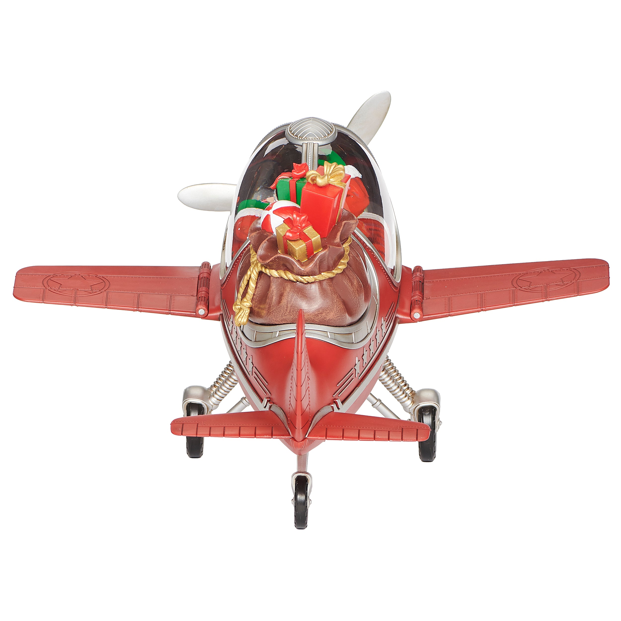 Red toy airplane with Santa Claus inside, carrying a sack of gifts on a white background