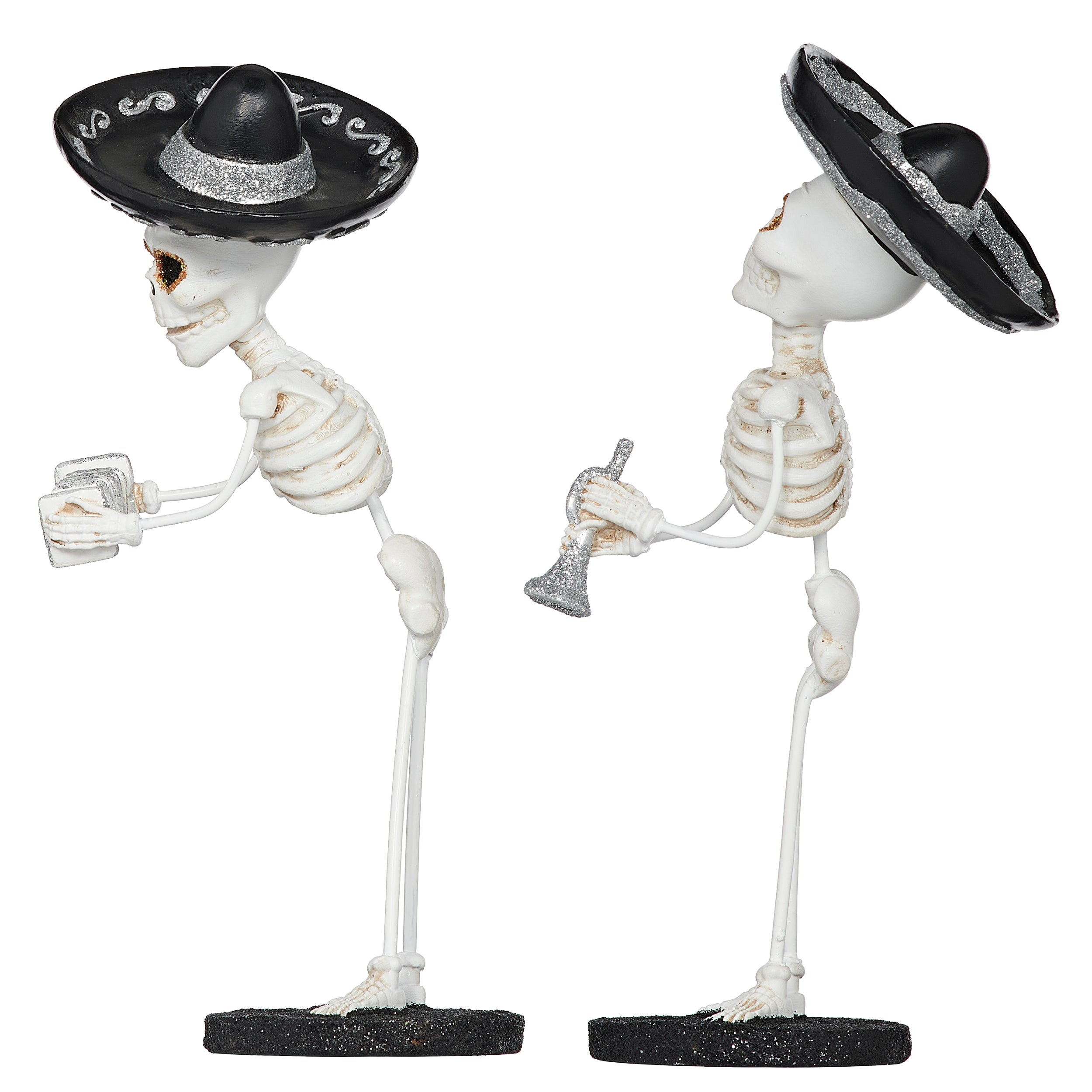 Two skeleton figures wearing sombreros