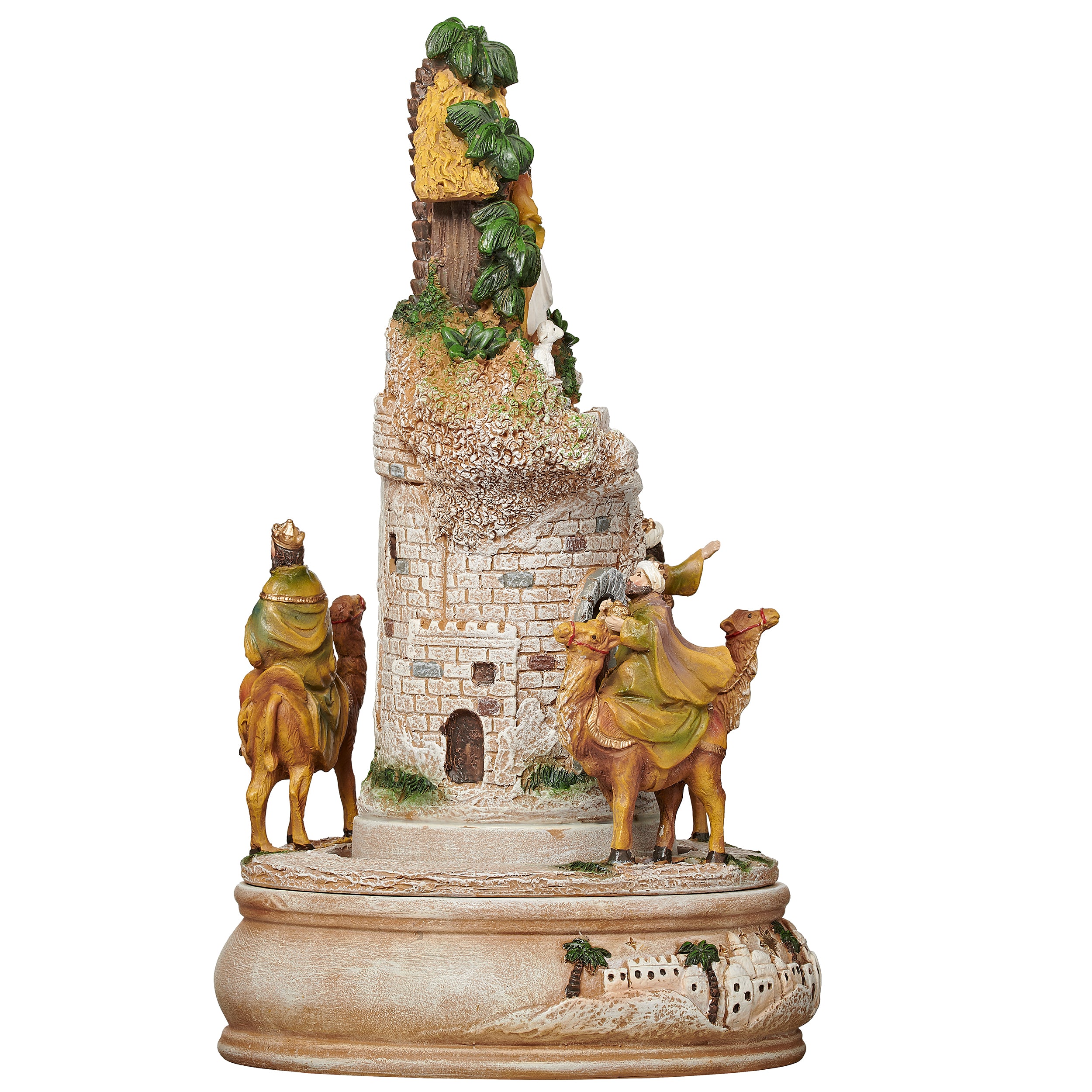 Decorative nativity scene figurine with stable and figures on a white background