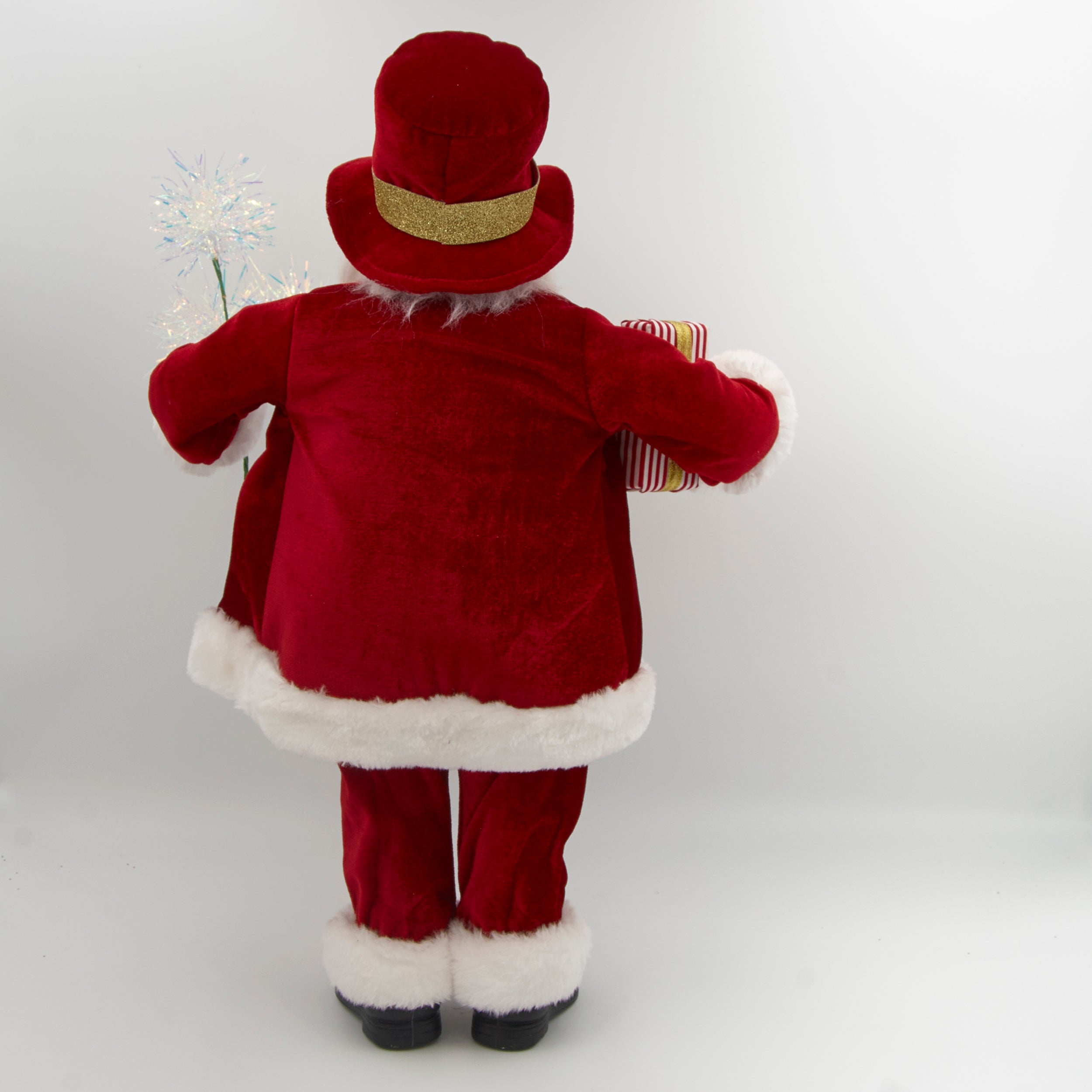 Traditional Santa Claus figure with American flag robe and sparklers on a white background