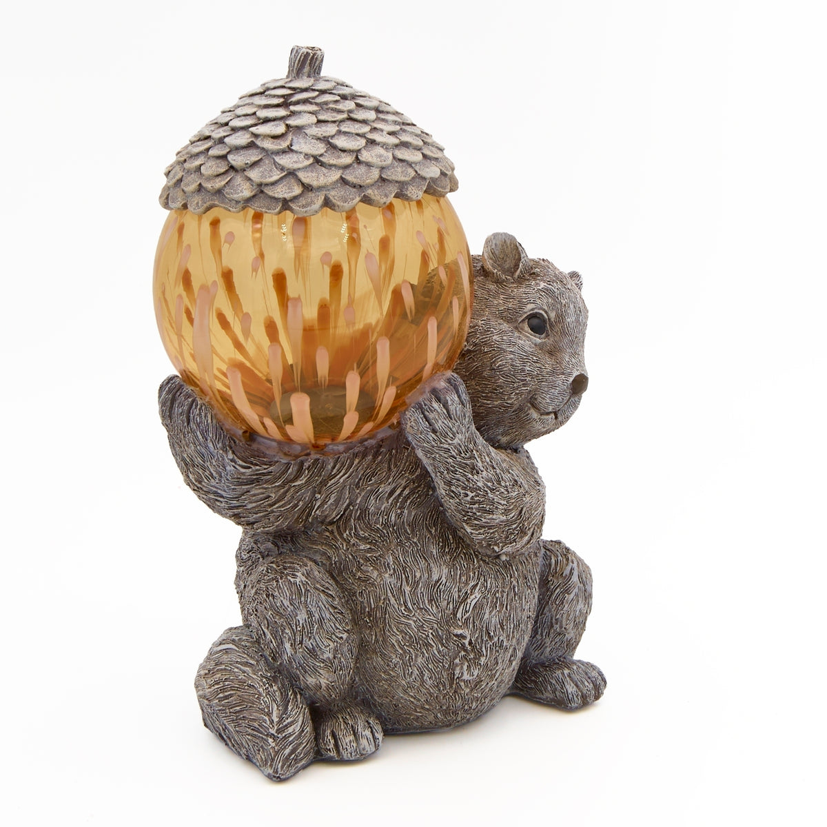 Side view of Pudgy Pals Solar-Powered Chipmunk Garden Statue showing the chipmunk holding the amber acorn light