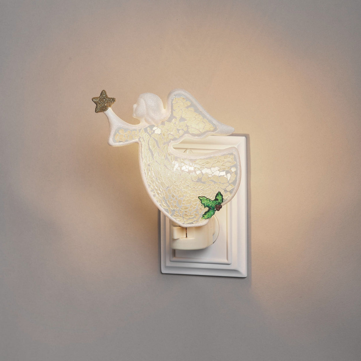 Decorative angel night light on a wall