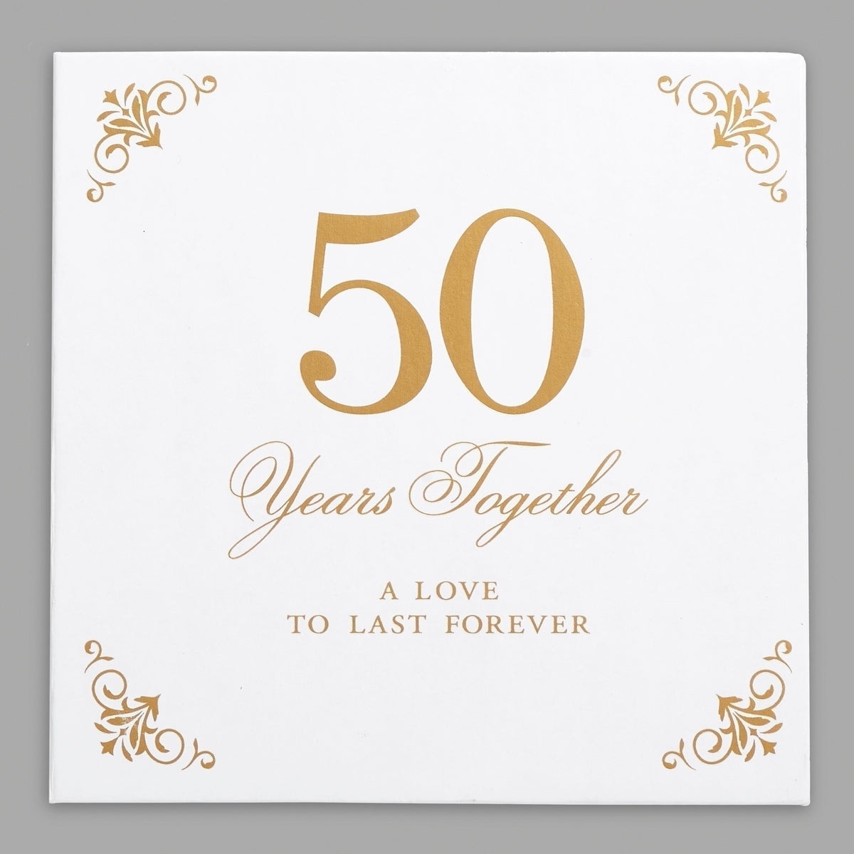 Closed white anniversary gift packaging with gold “50 Years Together” lettering and decorative corner accents.