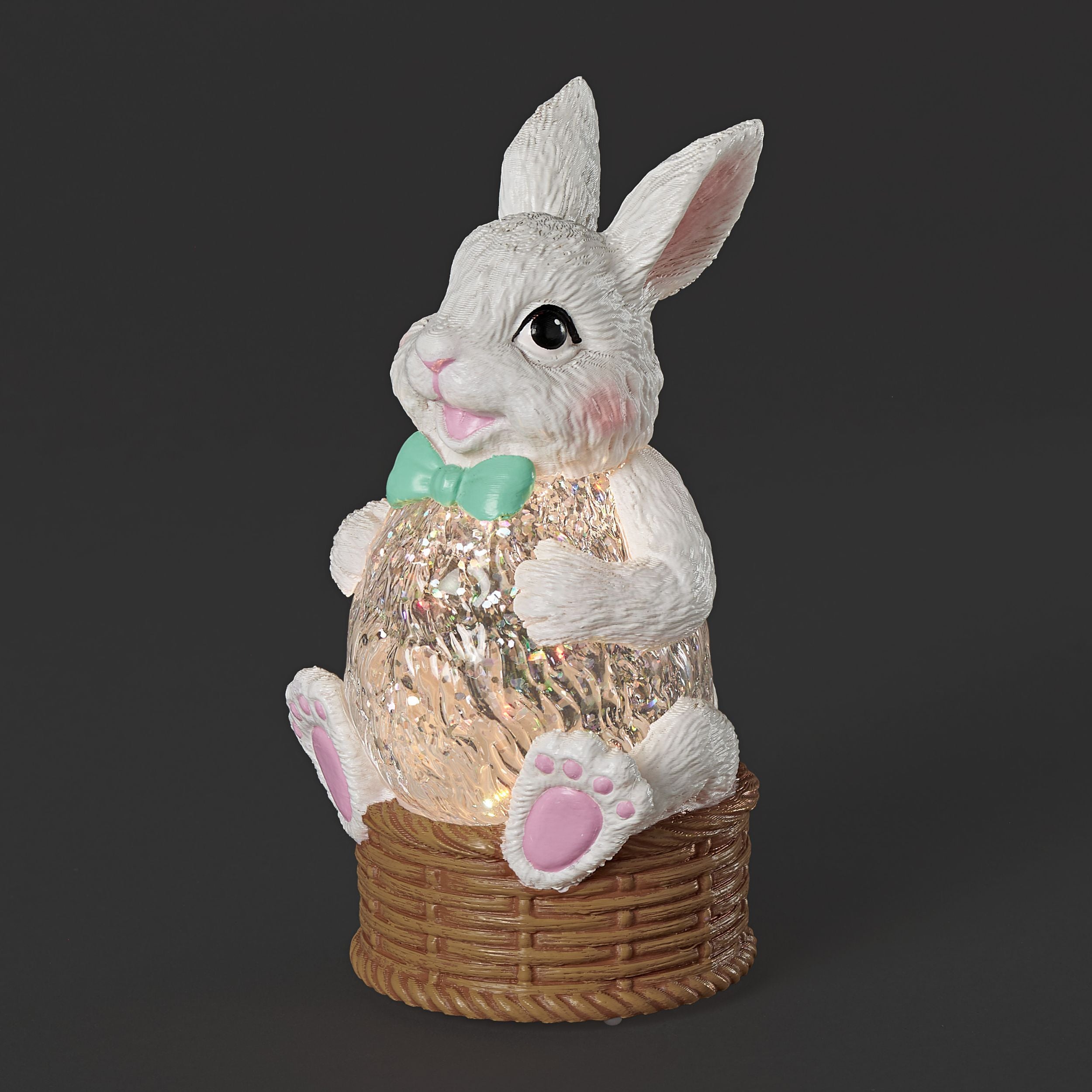 Decorative rabbit figure with a glowing interior on a dark background