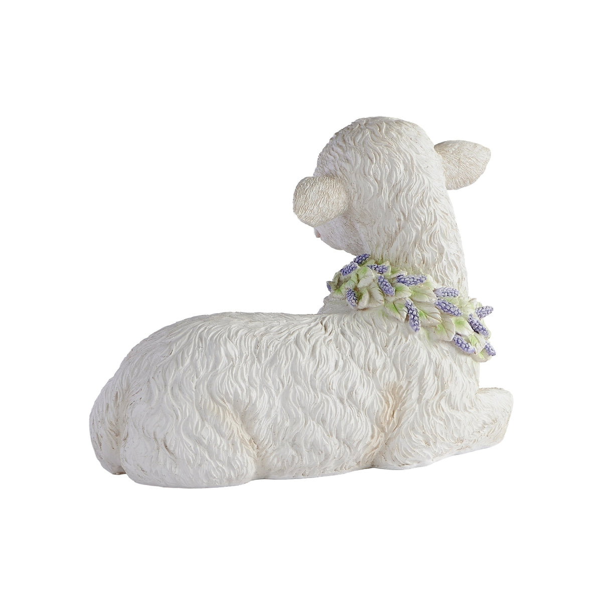 Side view of white Easter lamb figure with pastel floral wreath