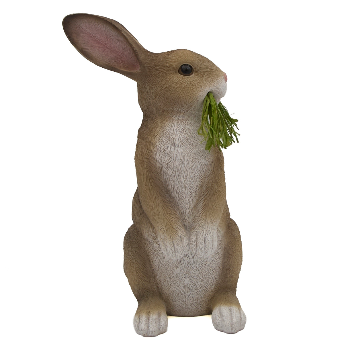 Front view of Easter bunny figure with green grass in its mouth