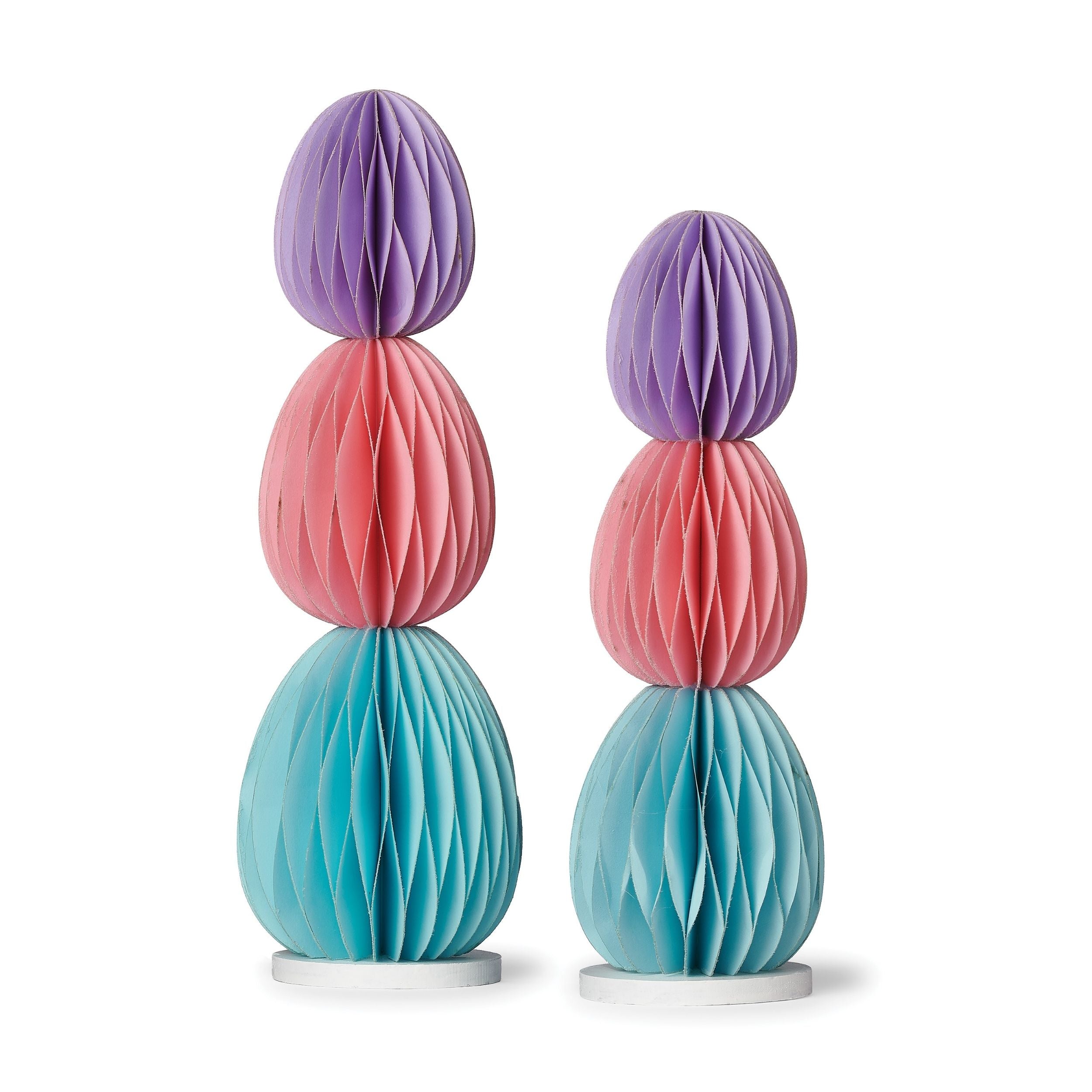 Set of three colorful honeycomb-shaped lamps on a white background