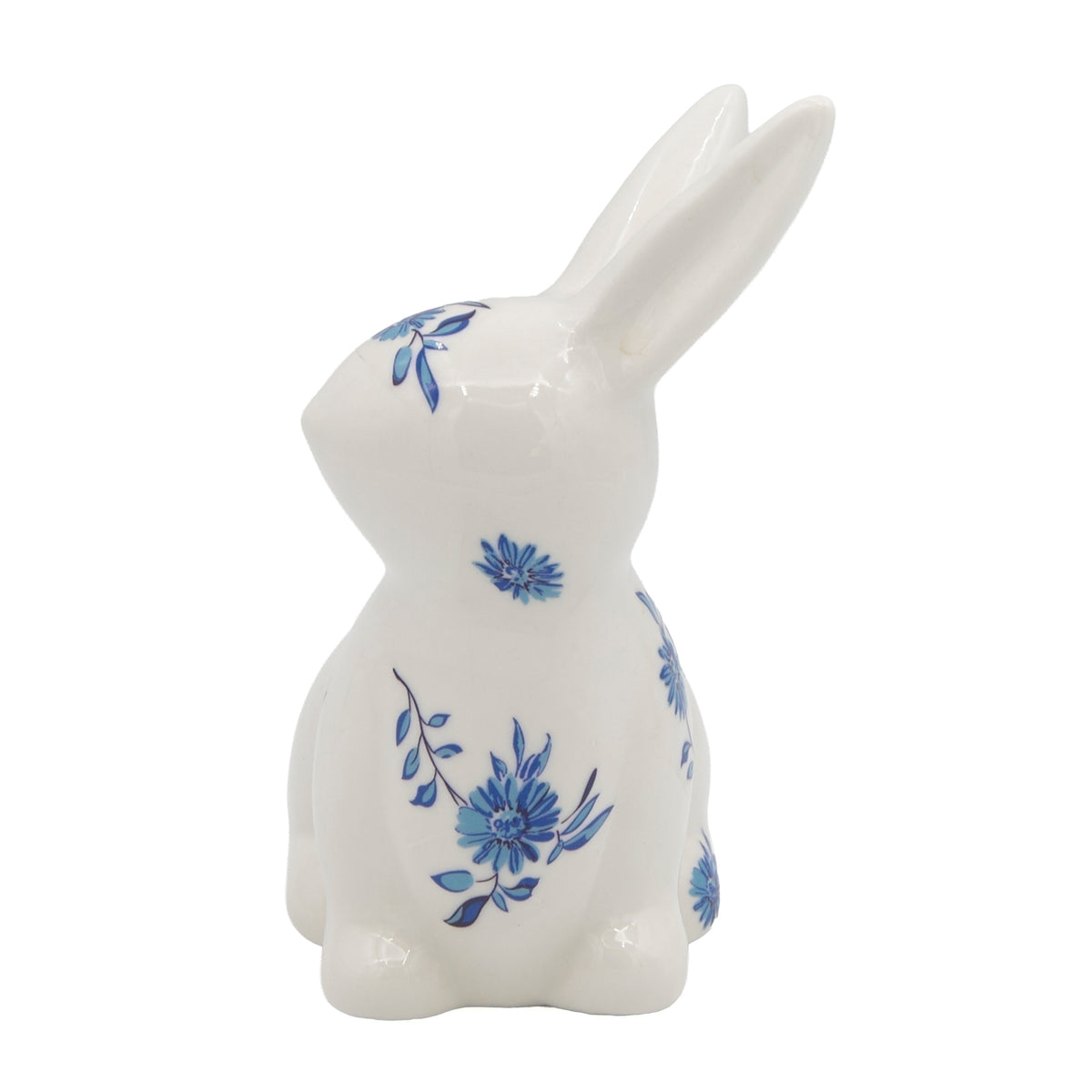 Sitting Blue Willow Bunny porcelain figure with blue floral design, opposite side view