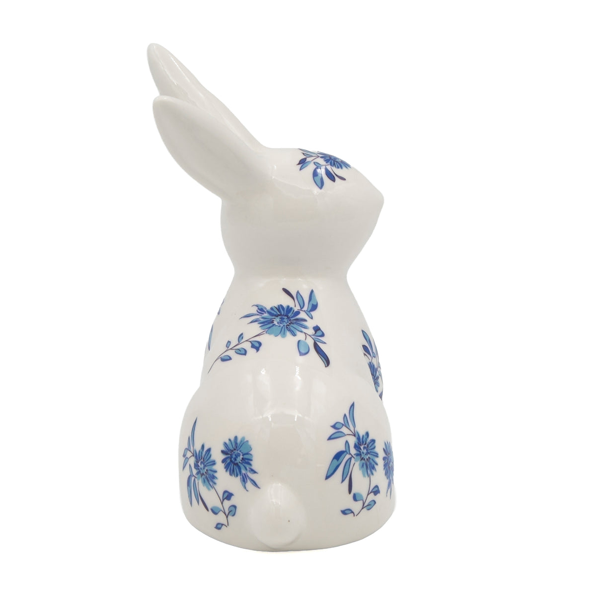 Sitting Blue Willow Bunny porcelain figure with blue floral design, rear angled view