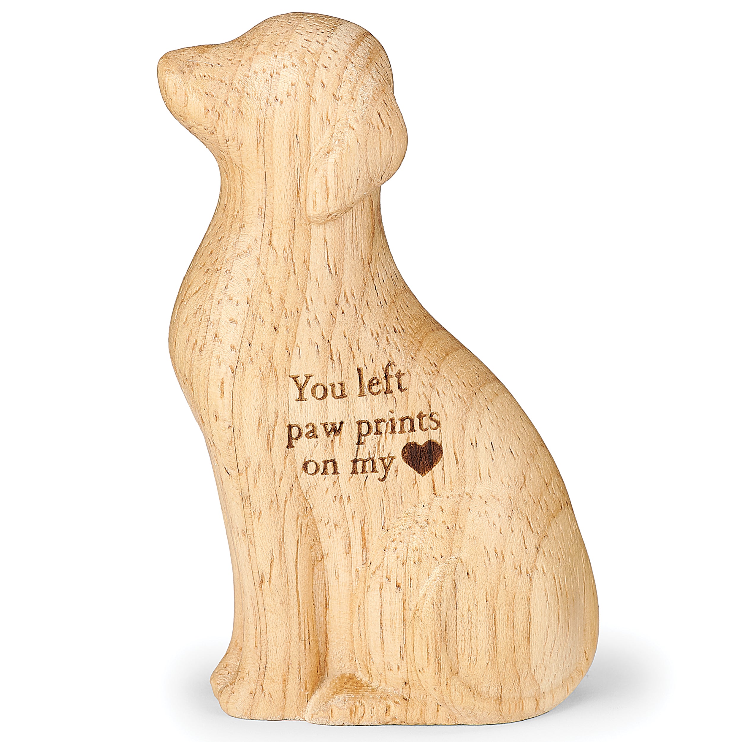 Wooden dog figurine with engraved message on a white background