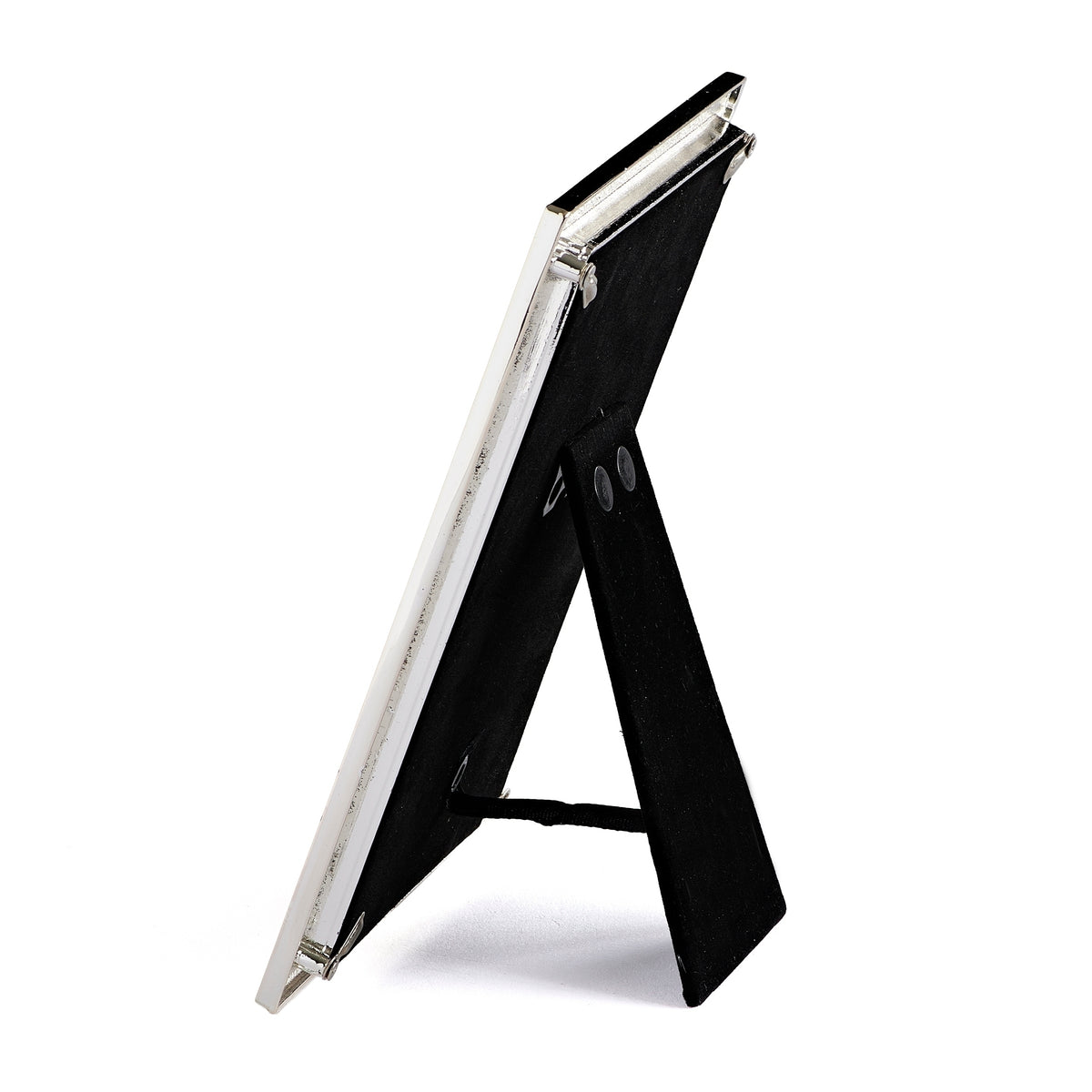 Side view of Caroline Collection First Communion picture frame showing the slim metal frame and open tabletop easel stand