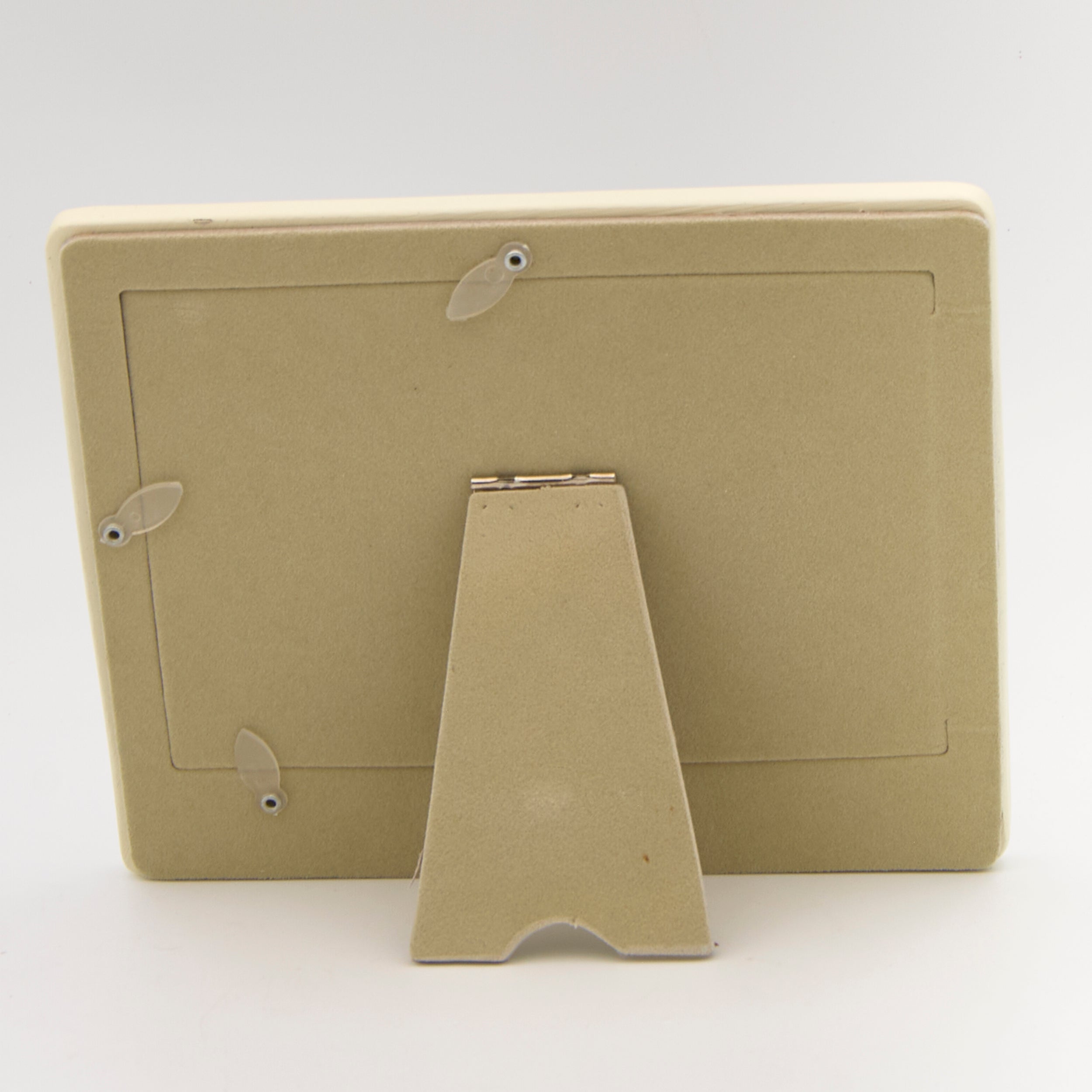 Back of easel back photo frame on light gray background