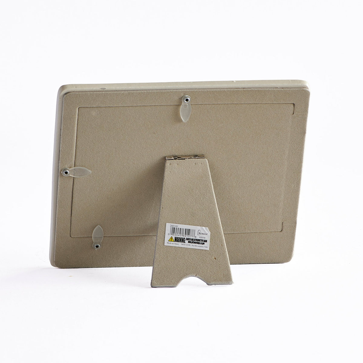 Back view of “Blessings on Your Baptism” picture frame showing the neutral backing and fold-out tabletop easel stand