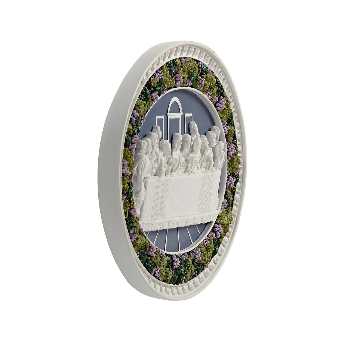 Side view of Last Supper Wall Plaque showing the oval profile, raised sculpted Last Supper relief, and decorative floral border