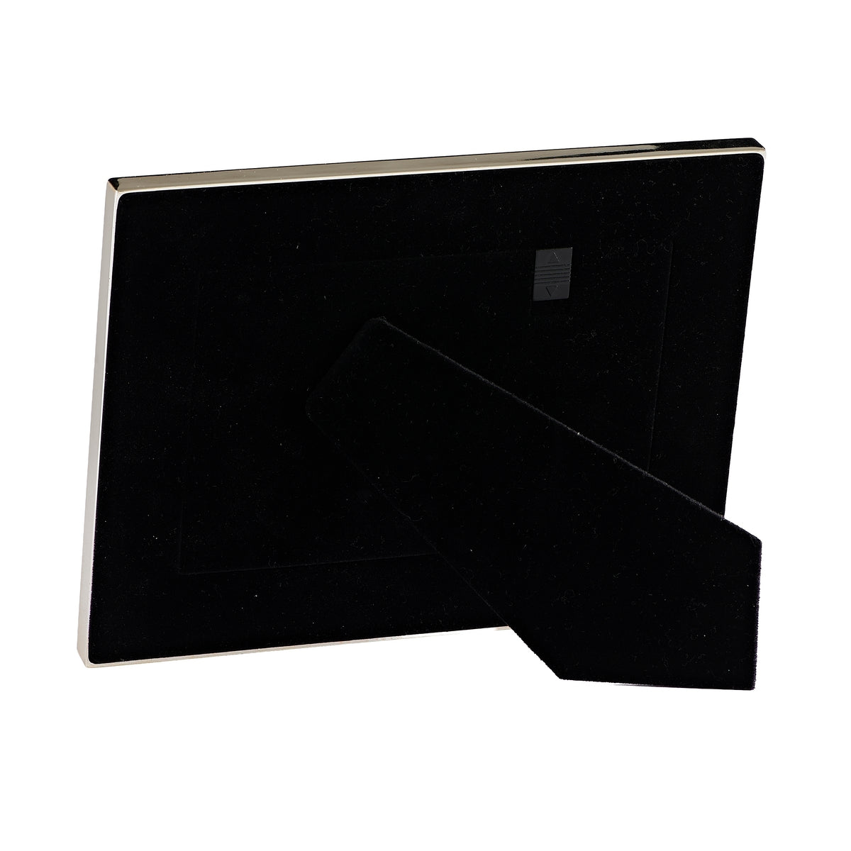Back angled view of Caroline Collection Baptism Shell Keepsake Picture Frame showing the black backing and tabletop stand