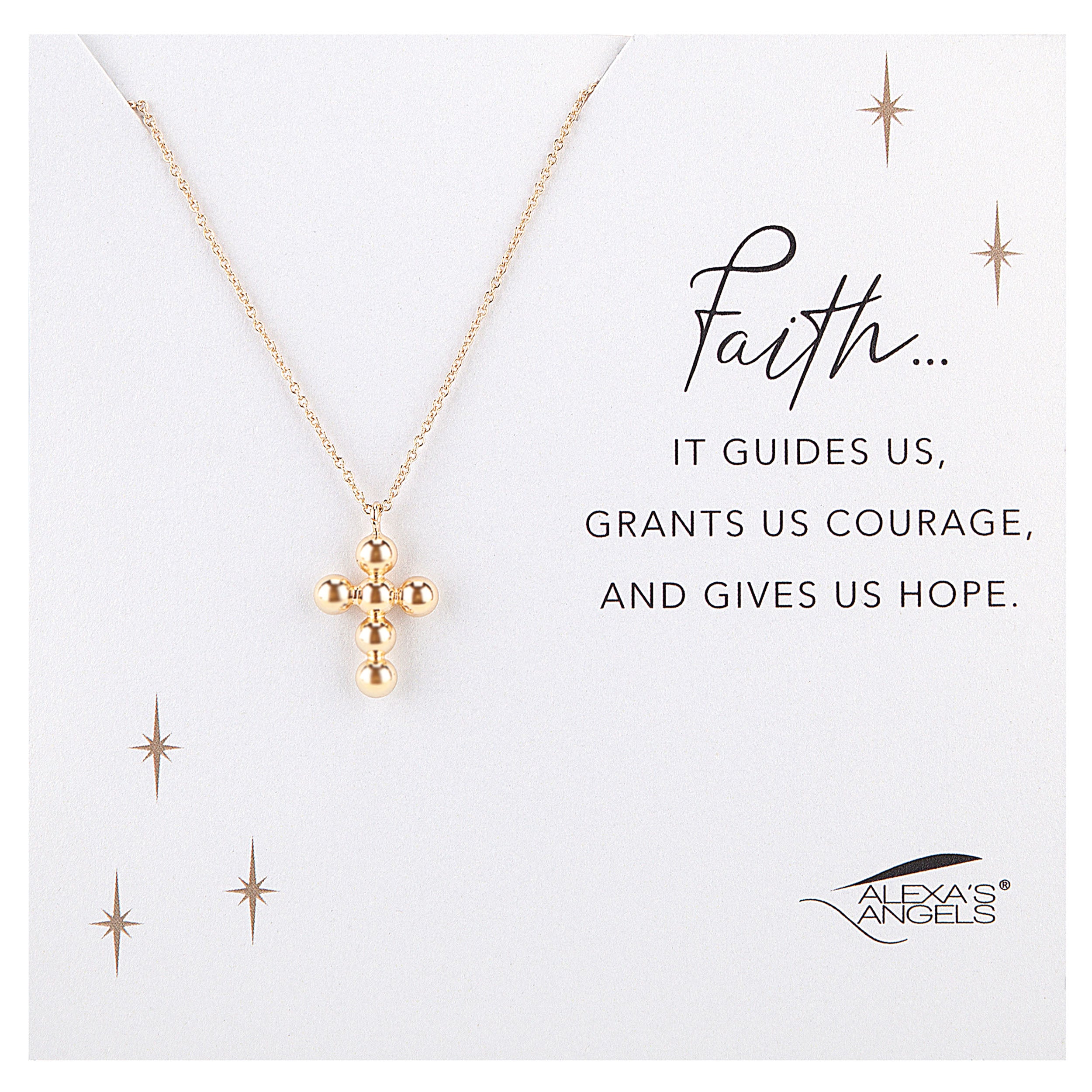 Gold necklace with cross pendant on a white card with text and brand logo