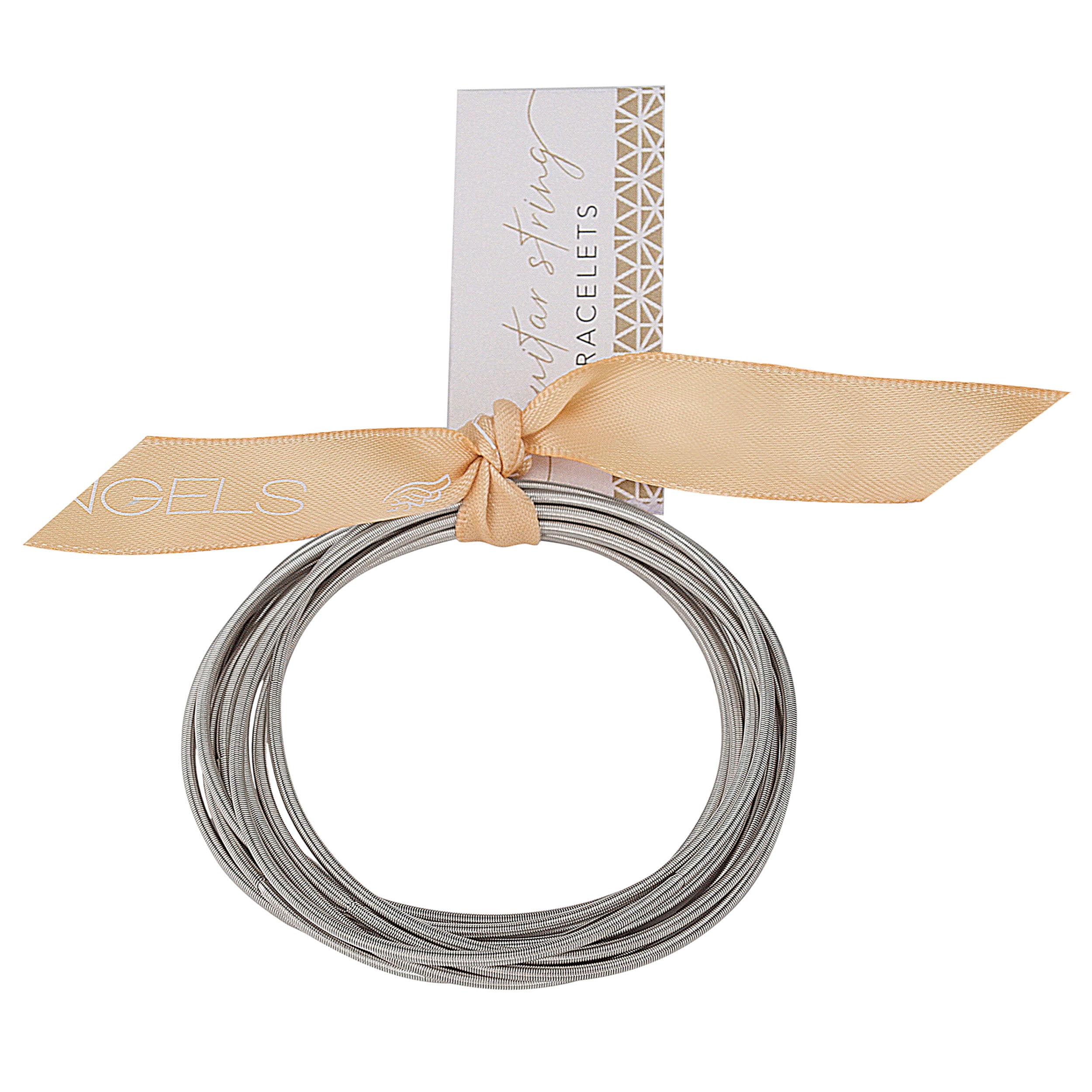 Coiled silver wire with a beige ribbon and packaging on a white background