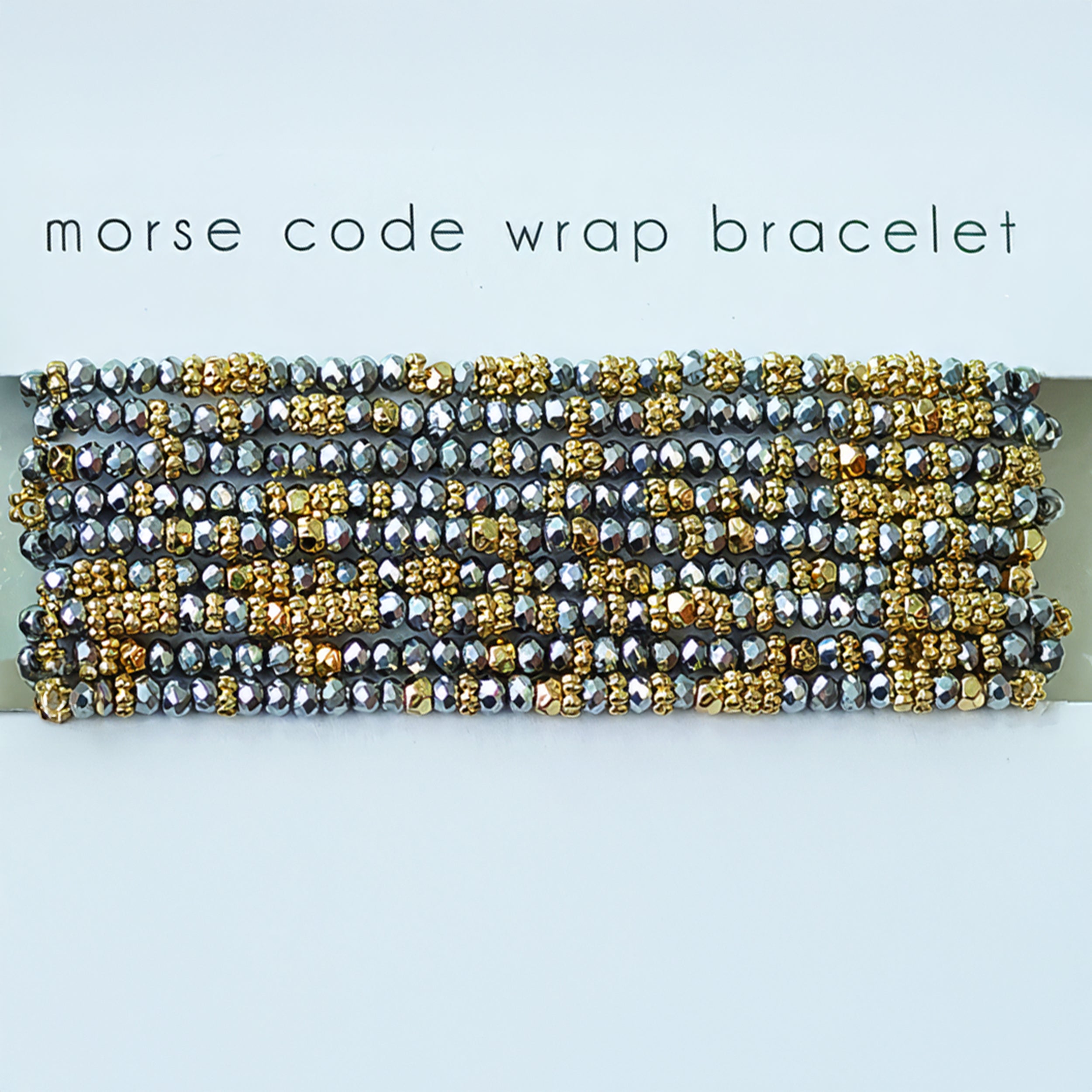 Beaded bracelet with gold and silver beads on a light blue background, labeled 'morse code wrap bracelet'.