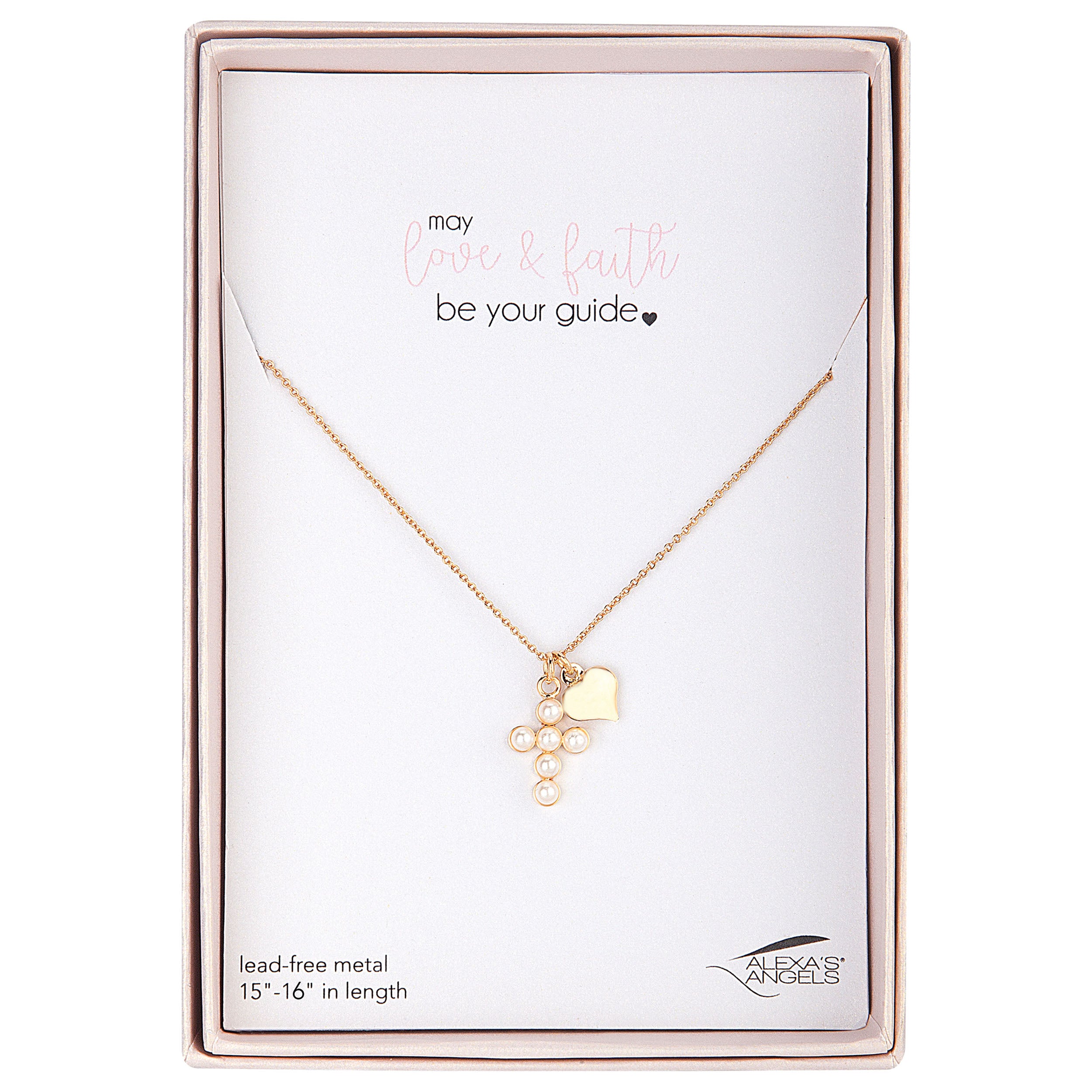 Gold necklace with pendant on a branded card